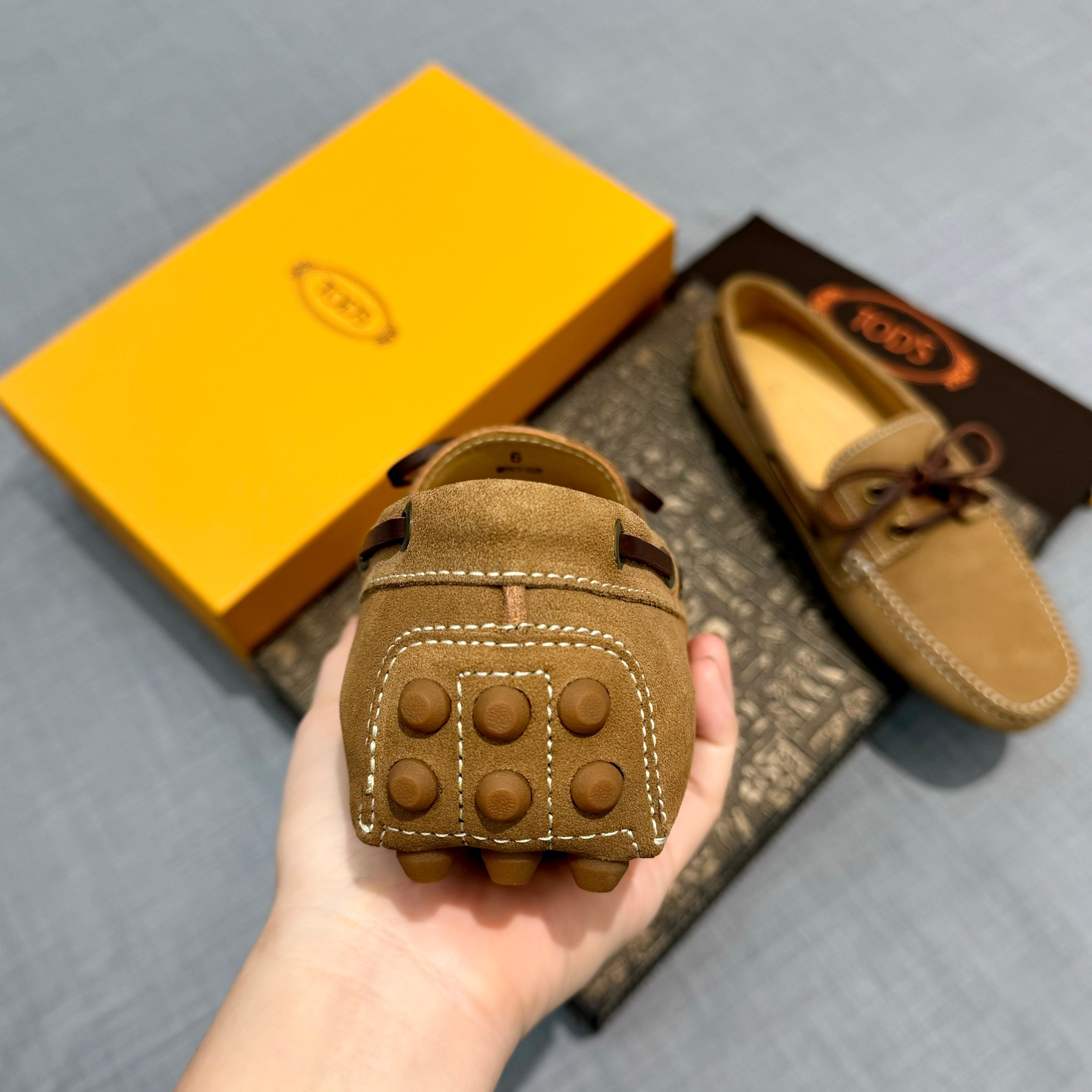 Precio de fábrica: [Tods] zapatos de soja para hombre Contra sincronización nueva calidad de gama al