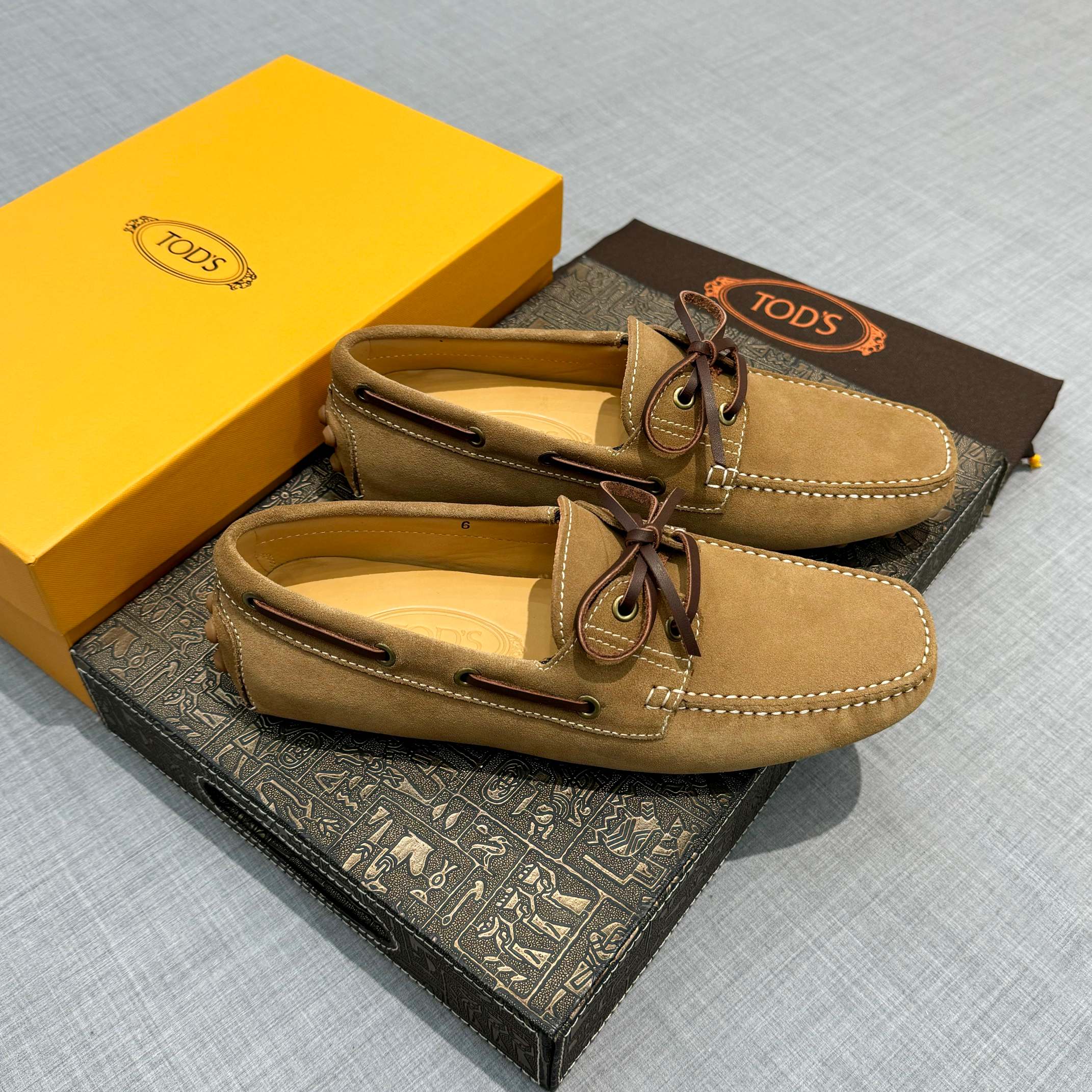 Precio de fábrica: [Tods] zapatos de soja para hombre Contra sincronización nueva calidad de gama al
