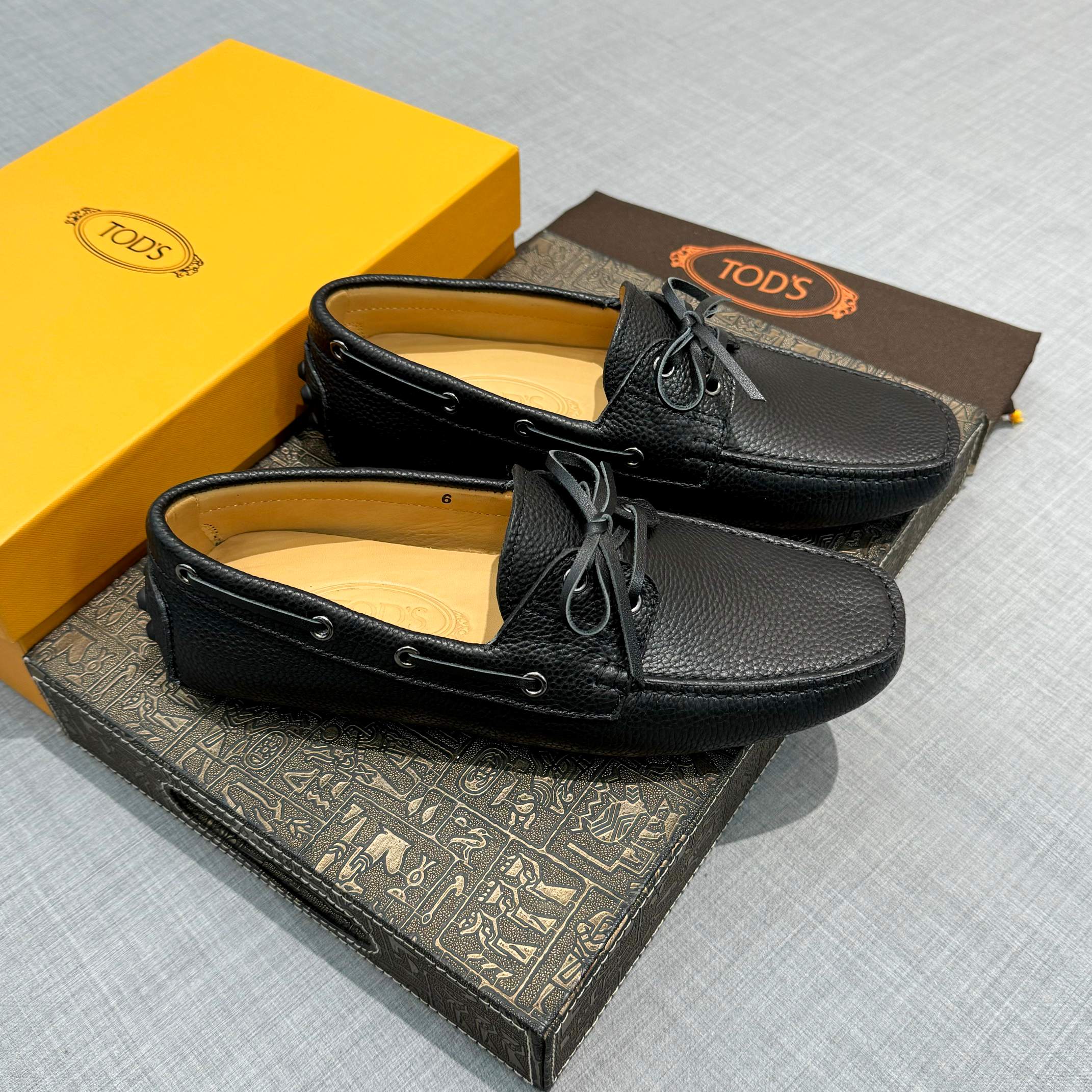 Precio de fábrica: [Tods] zapatos de hombre de soja Sincronización de contador nueva calidad de gama