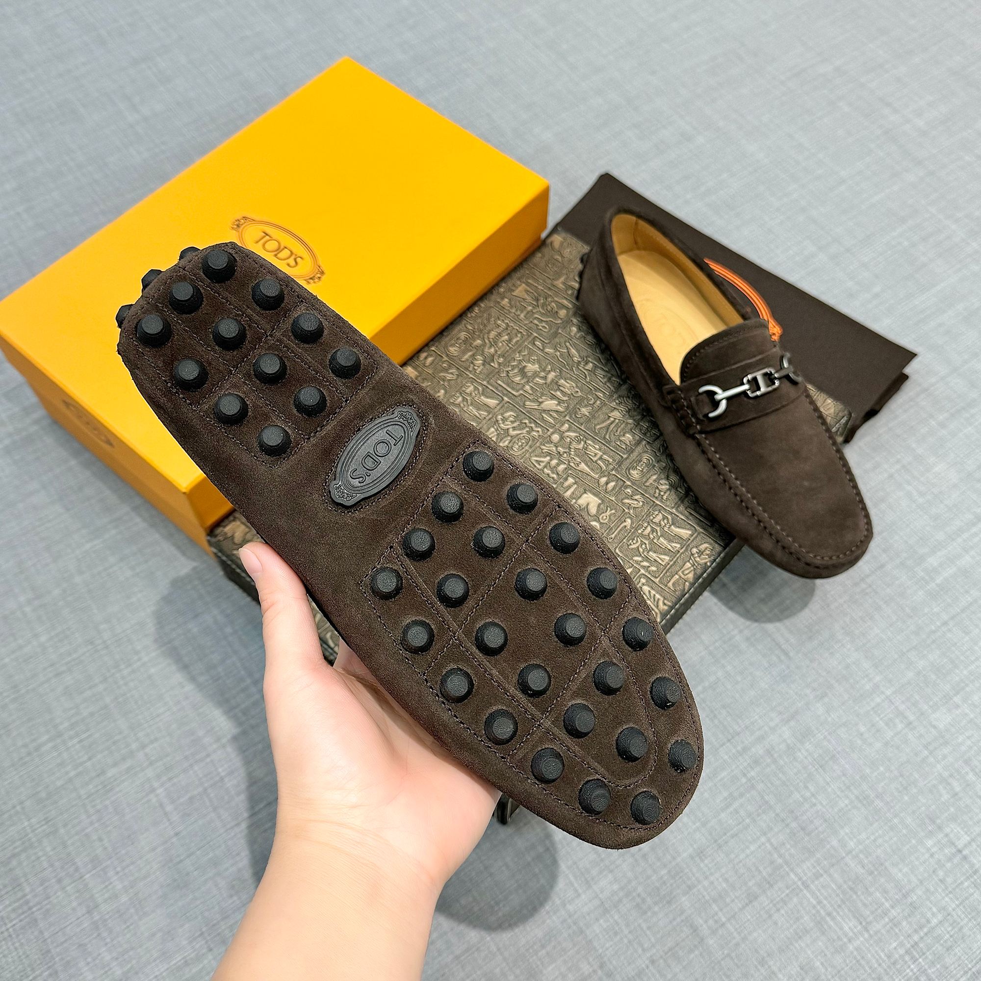 Precio de fábrica: [Tods] zapatos de soja de los hombres Contra sincronización nueva calidad de gama