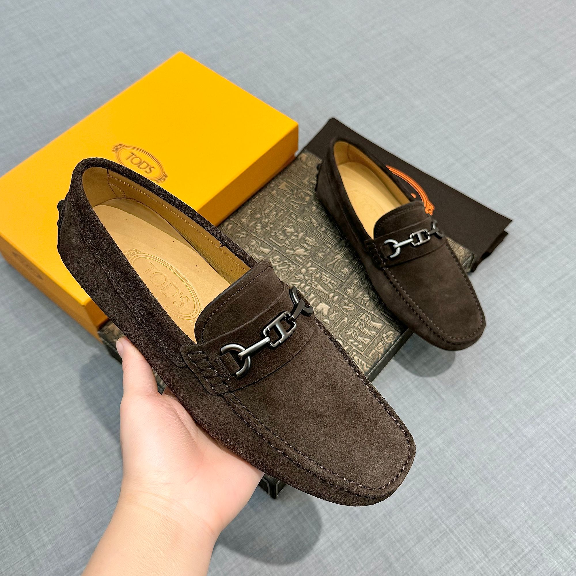 Precio de fábrica: [Tods] zapatos de soja de los hombres Contra sincronización nueva calidad de gama
