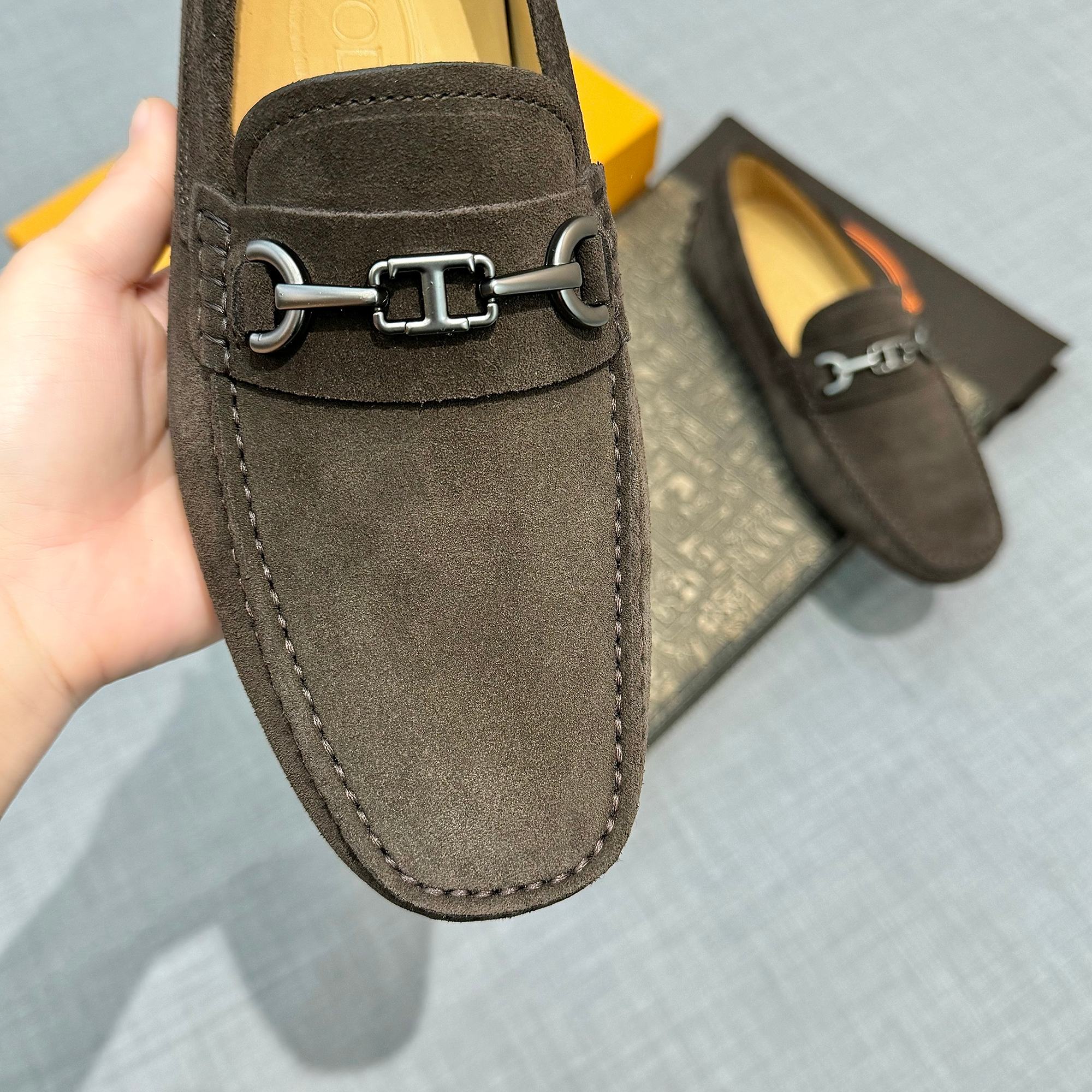 Precio de fábrica: [Tods] zapatos de soja de los hombres Contra sincronización nueva calidad de gama