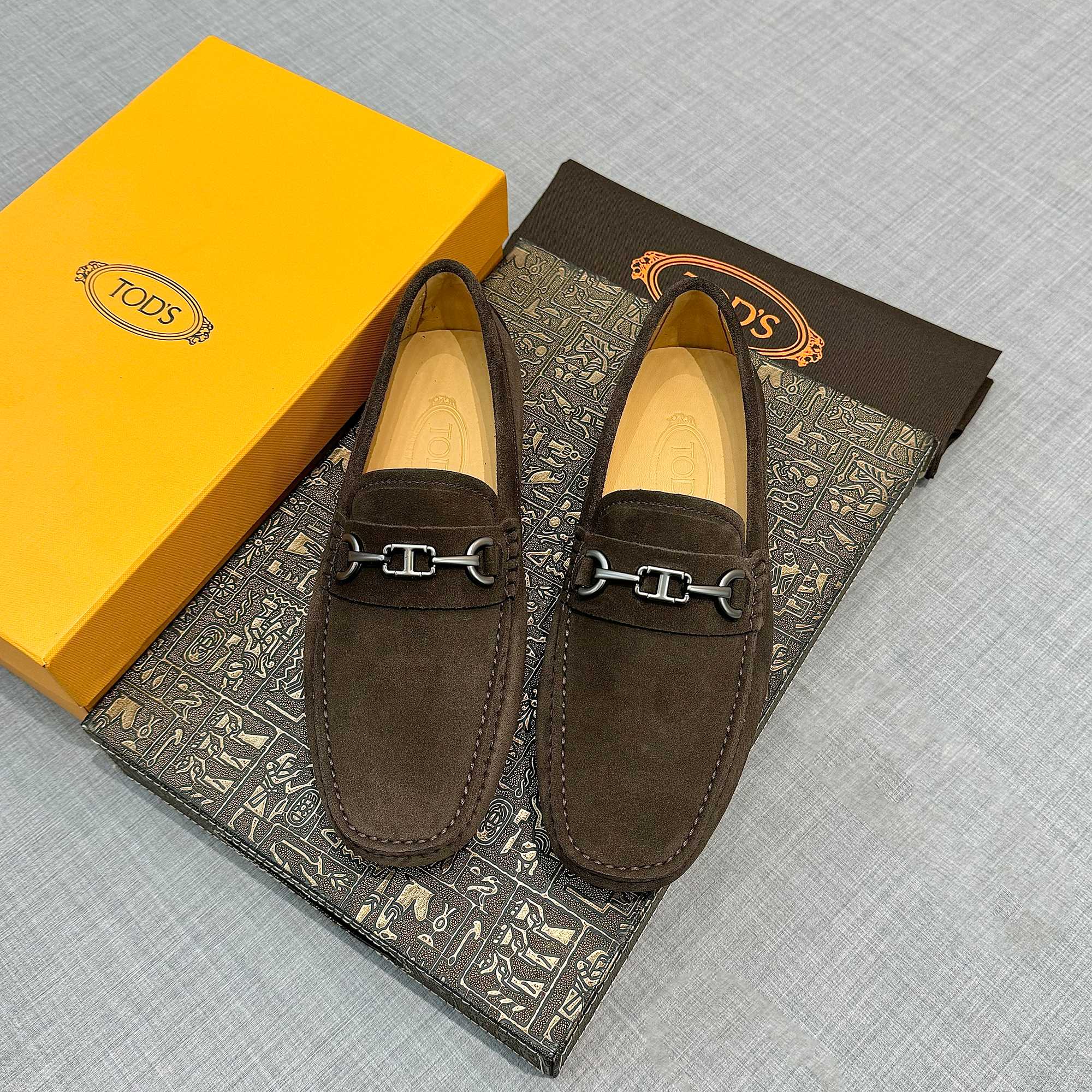 Precio de fábrica: [Tods] zapatos de soja de los hombres Contra sincronización nueva calidad de gama