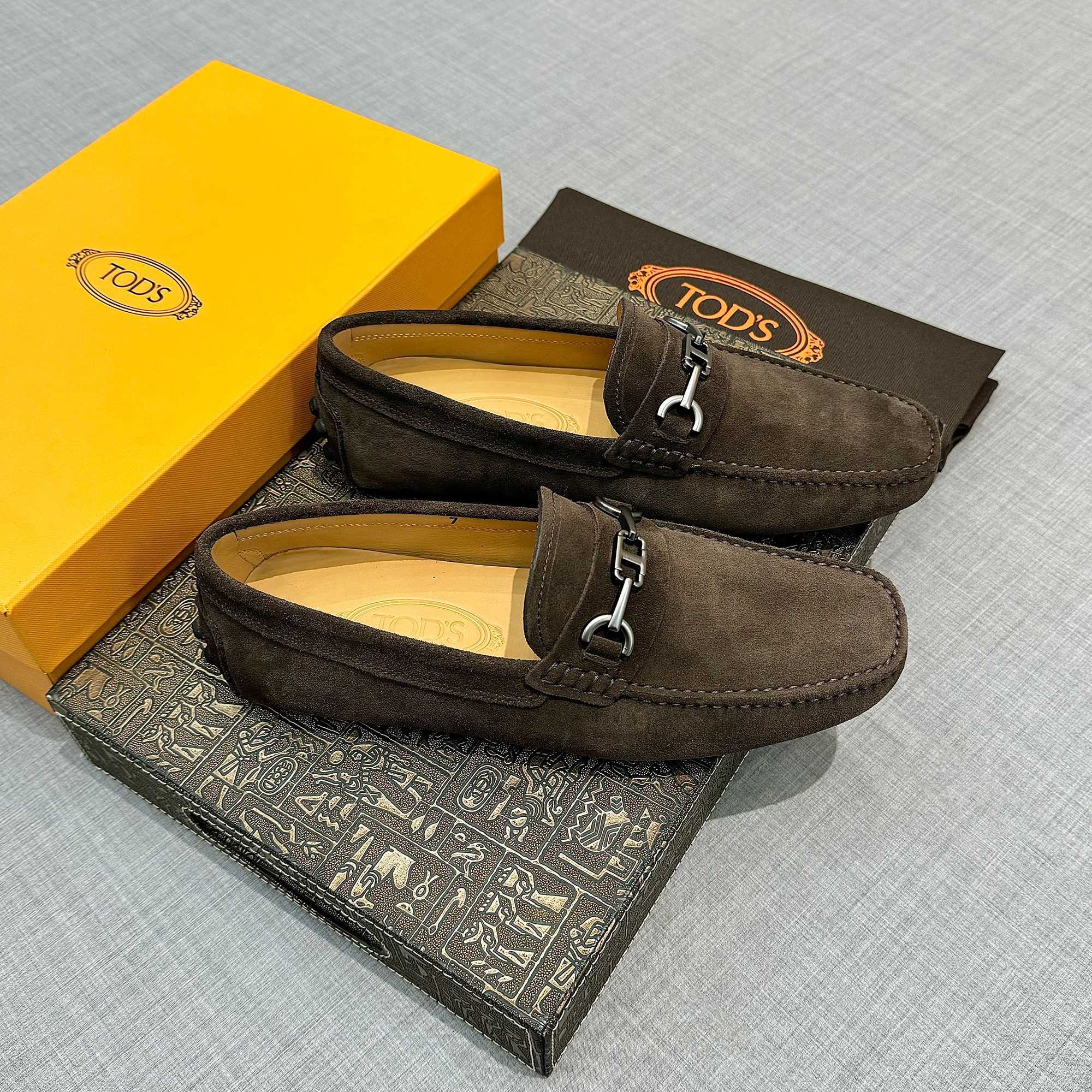 Precio de fábrica: [Tods] zapatos de soja de los hombres Contra sincronización nueva calidad de gama