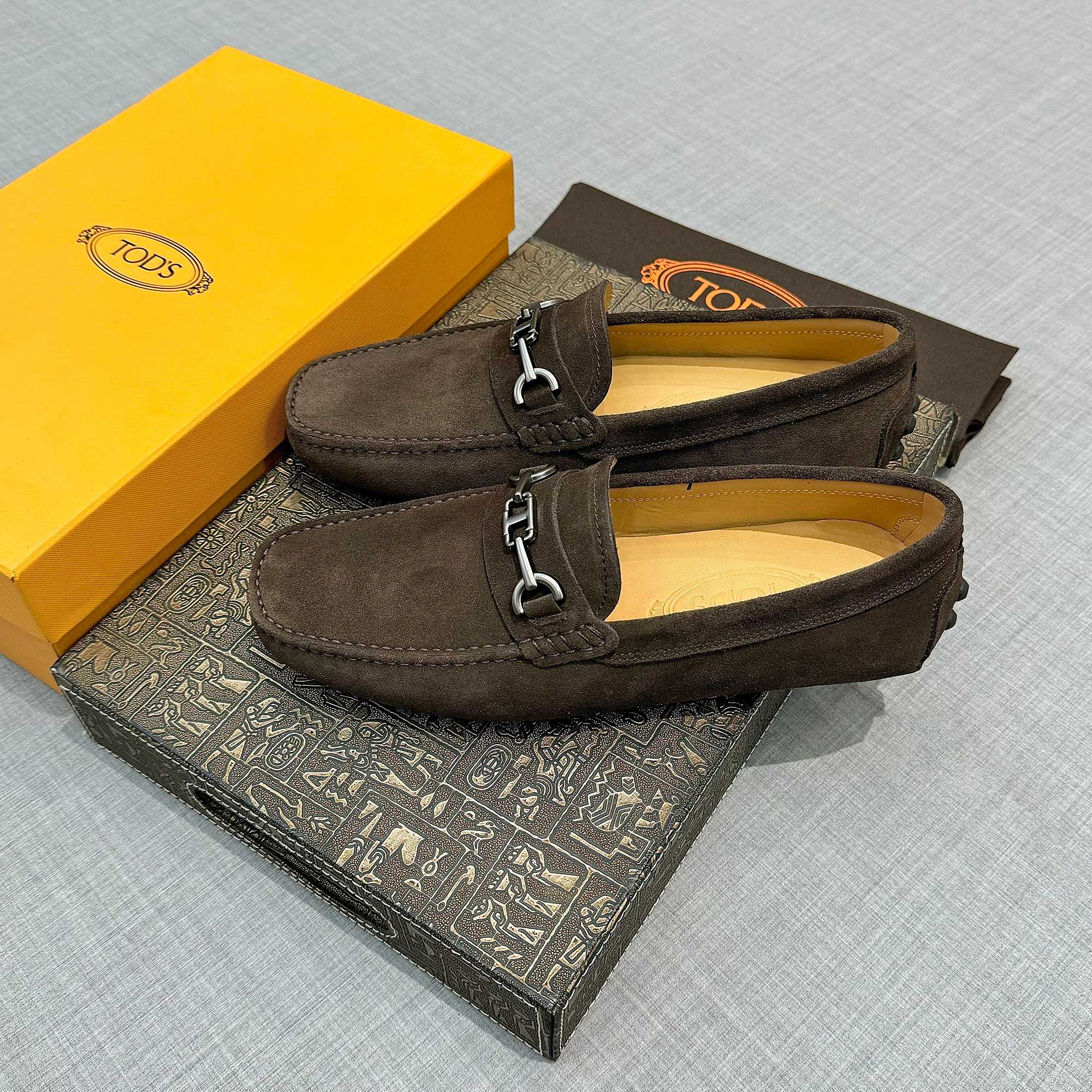 Precio de fábrica: [Tods] zapatos de soja de los hombres Contra sincronización nueva calidad de gama
