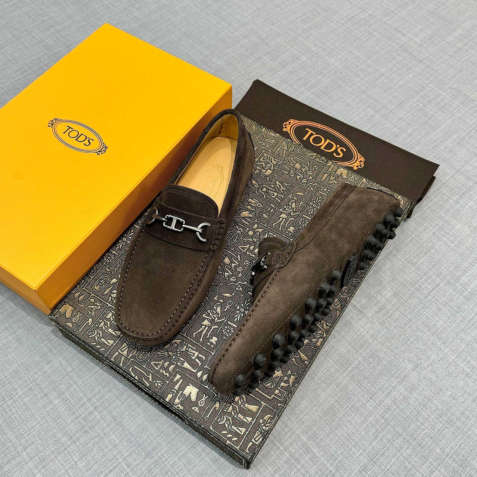 Precio de fábrica: [Tods] zapatos de soja de los hombres Contra sincronización nueva calidad de gama