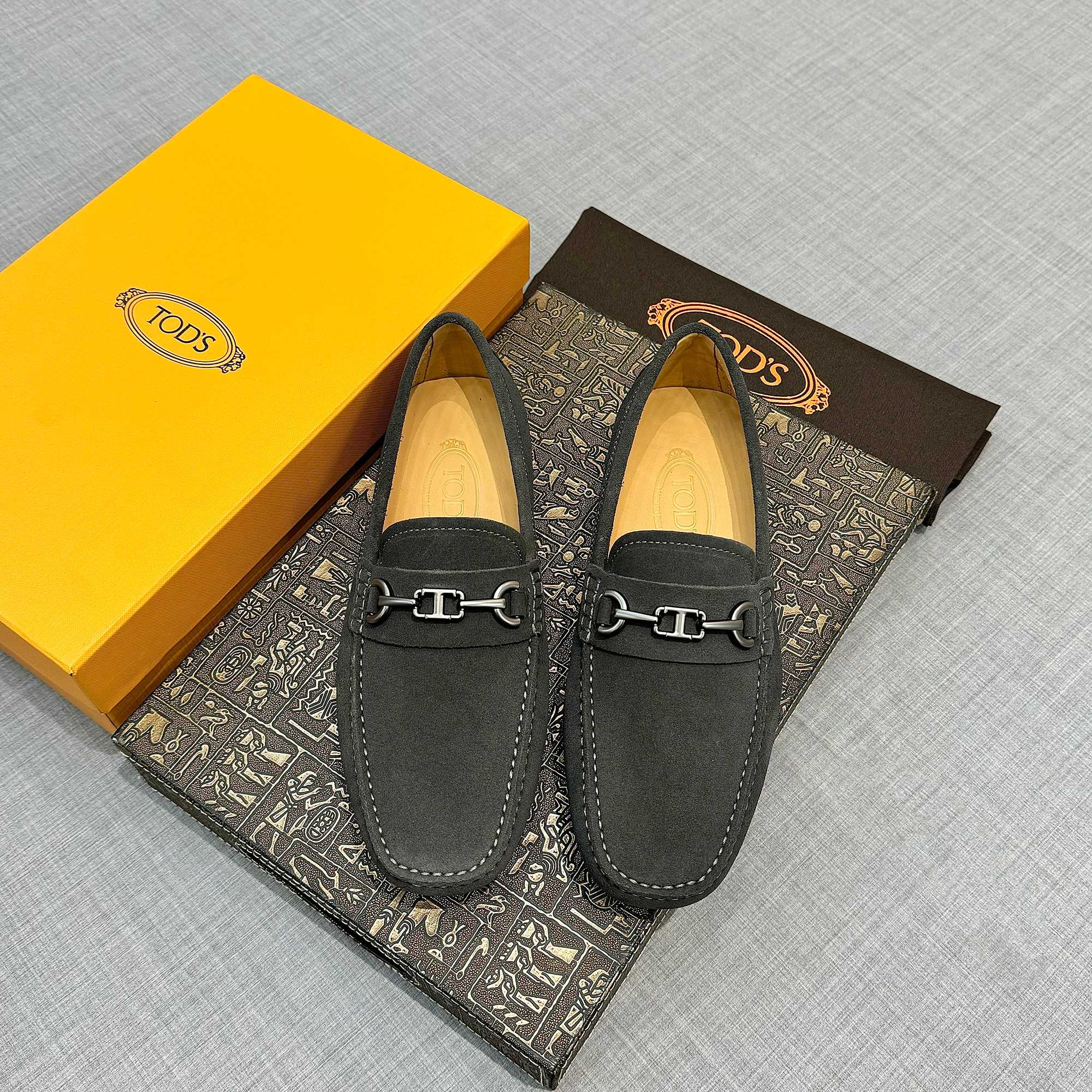 Precio de fábrica: [Tods] zapatos de soja de los hombres Contra sincronización nueva calidad de gama