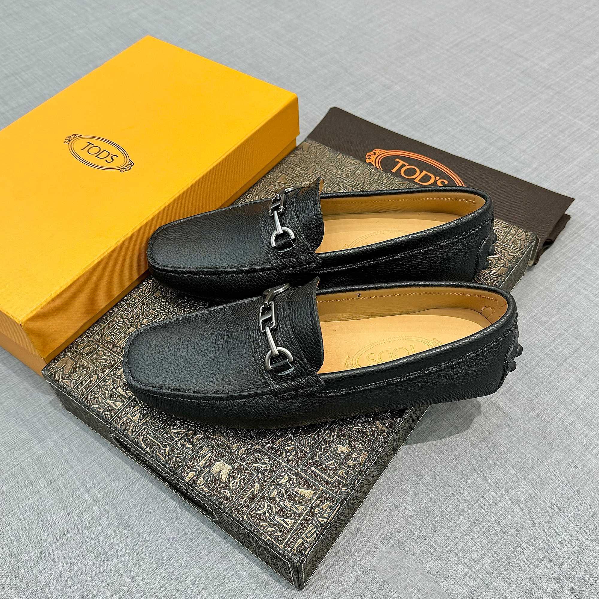 Precio de fábrica: [Tods] zapatos de hombre de soja Sincronización de contador nueva calidad de gama