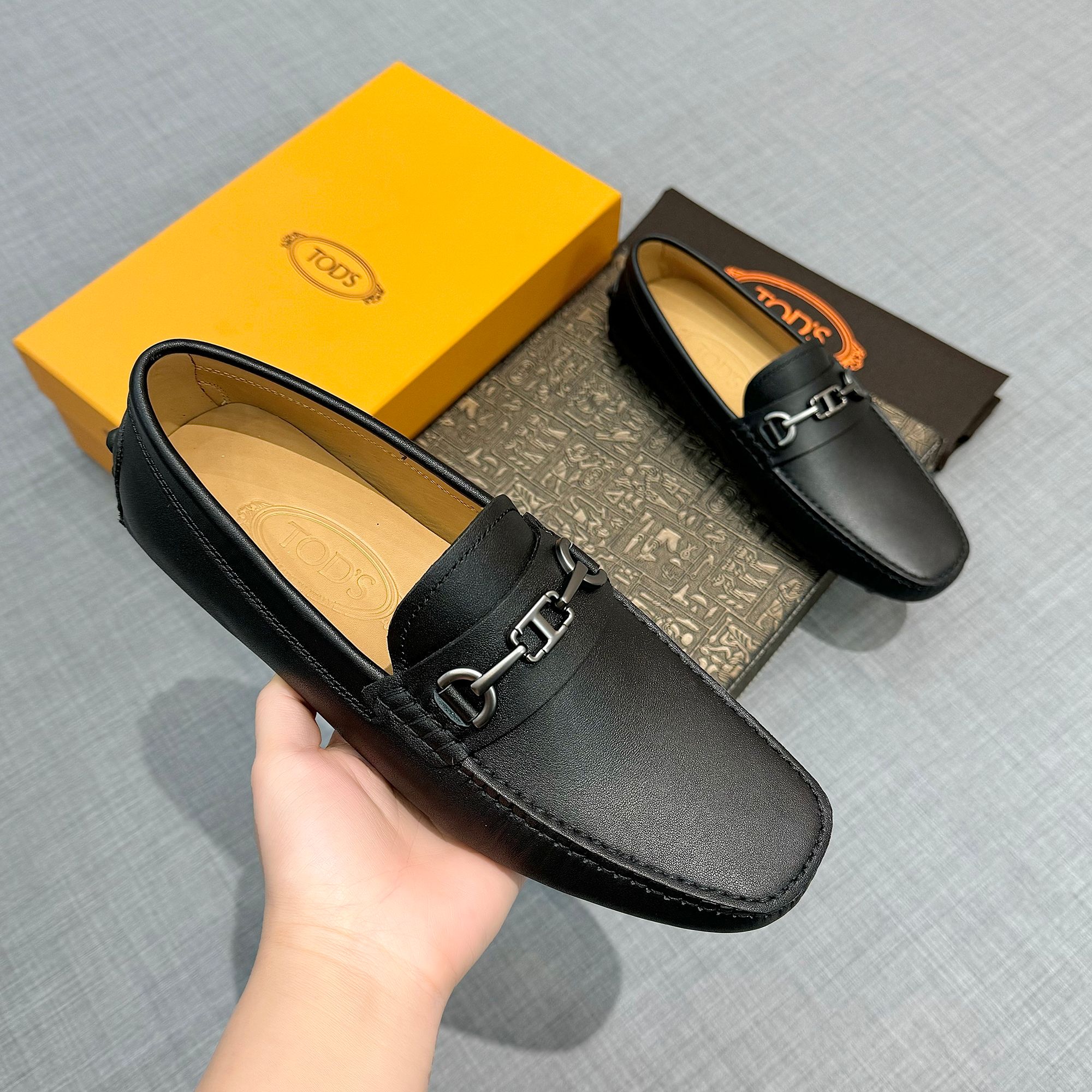 Precio de fábrica: [Tods] zapatos de hombre de soja Sincronización de contador nueva calidad de gama