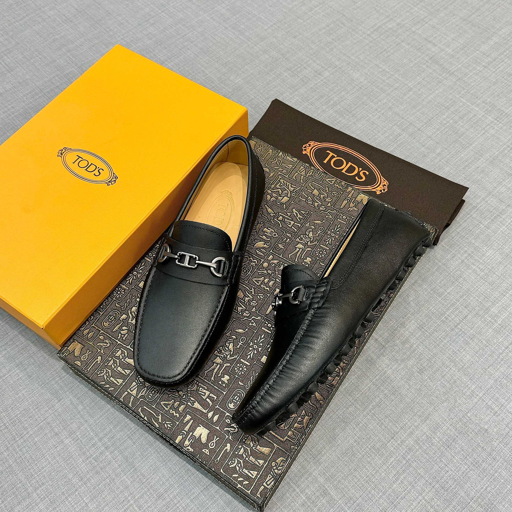 Precio de fábrica: [Tods] zapatos de hombre de soja Sincronización de contador nueva calidad de gama