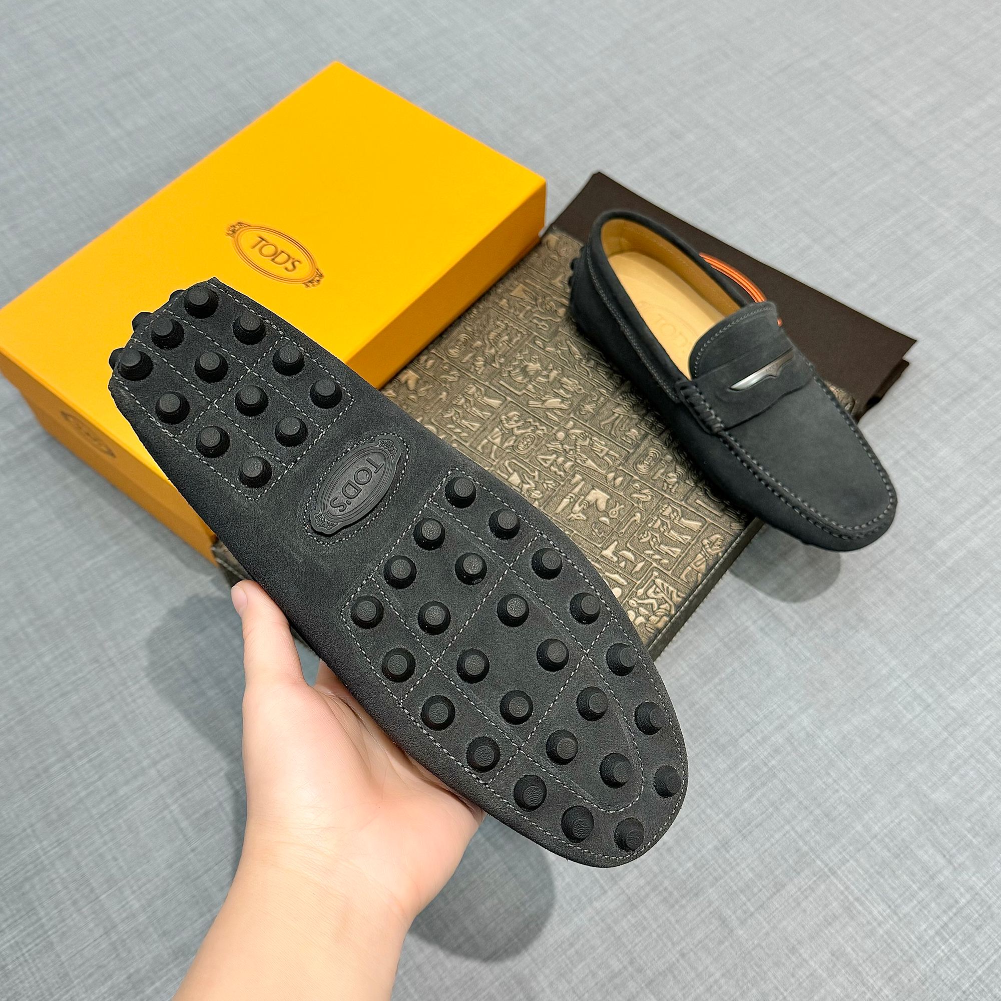 Precio de fábrica: [Tods] zapatos de soja de los hombres Contra sincronización nueva calidad de gama