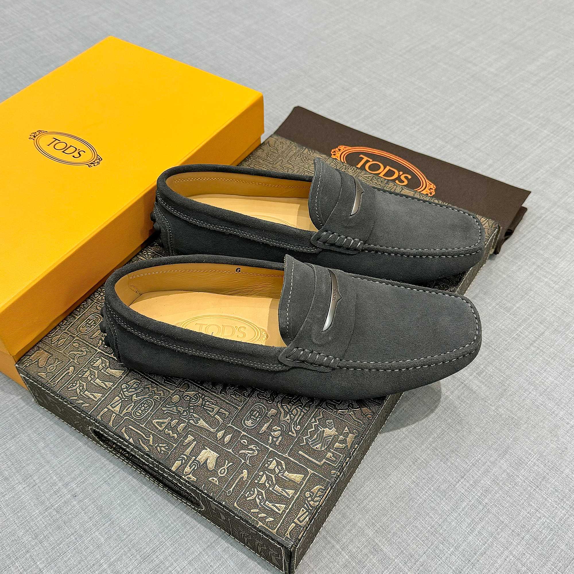 Precio de fábrica: [Tods] zapatos de soja de los hombres Contra sincronización nueva calidad de gama