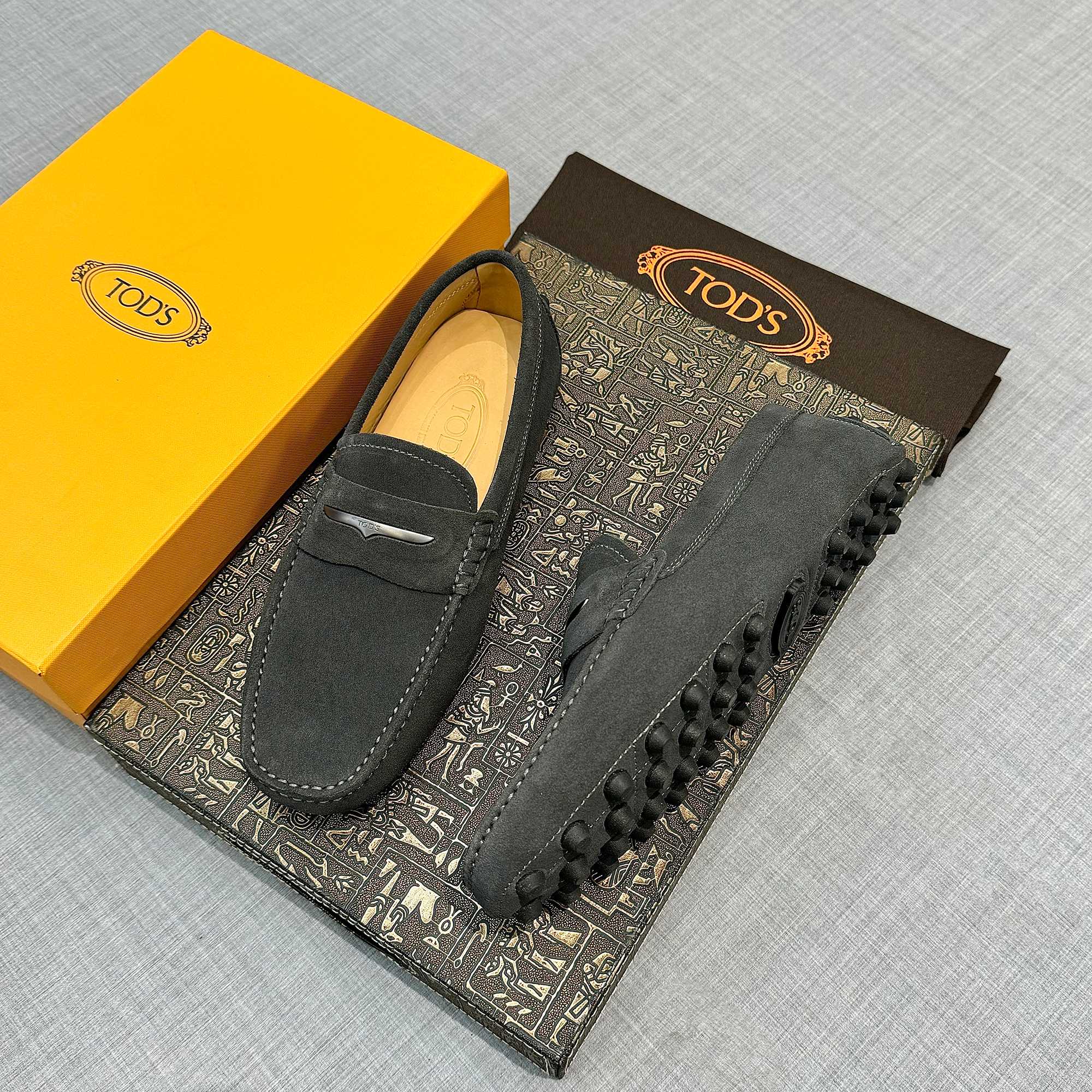 Precio de fábrica: [Tods] zapatos de soja de los hombres Contra sincronización nueva calidad de gama