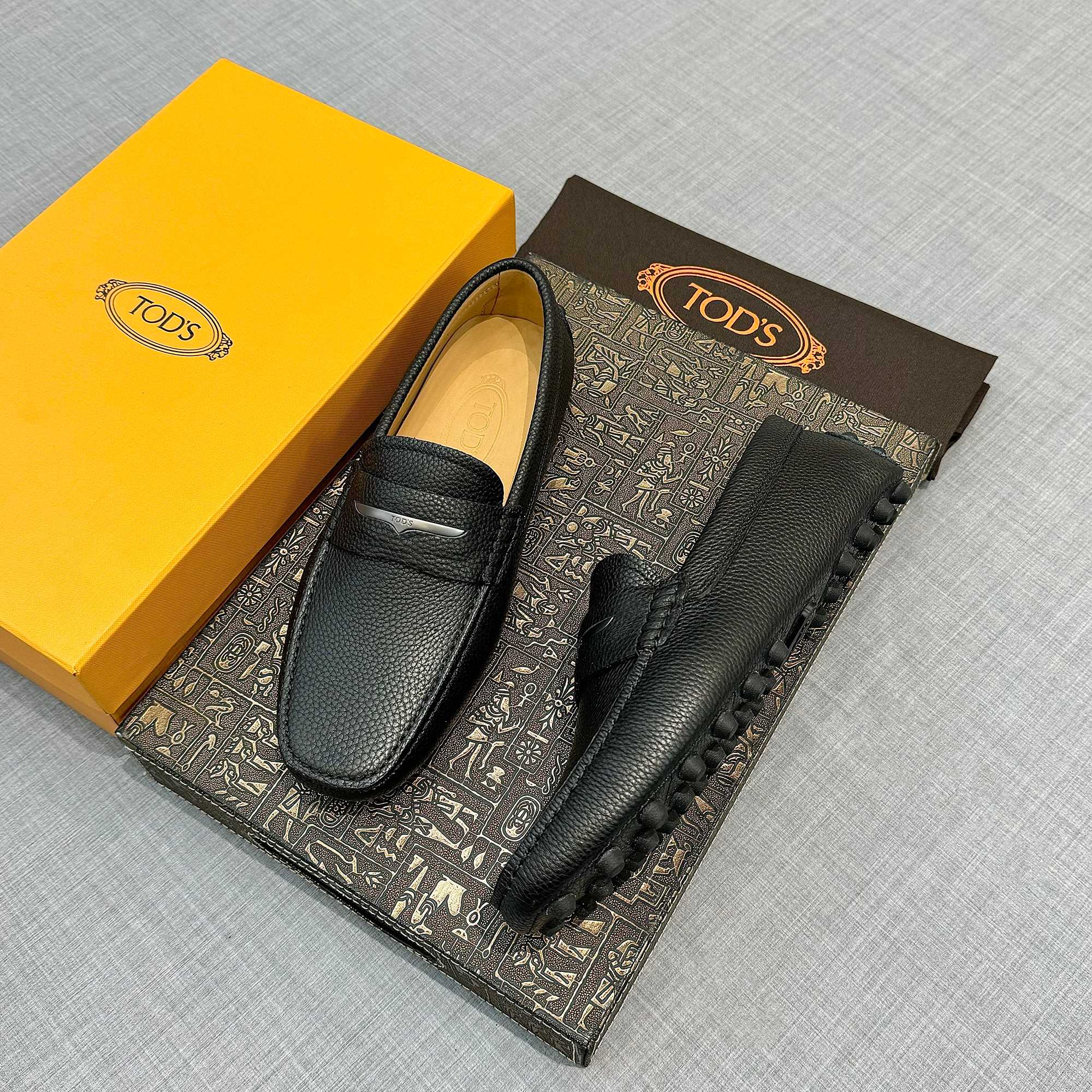 Precio de fábrica: [Tods] zapatos de hombre de soja Sincronización de contador nueva calidad de gama