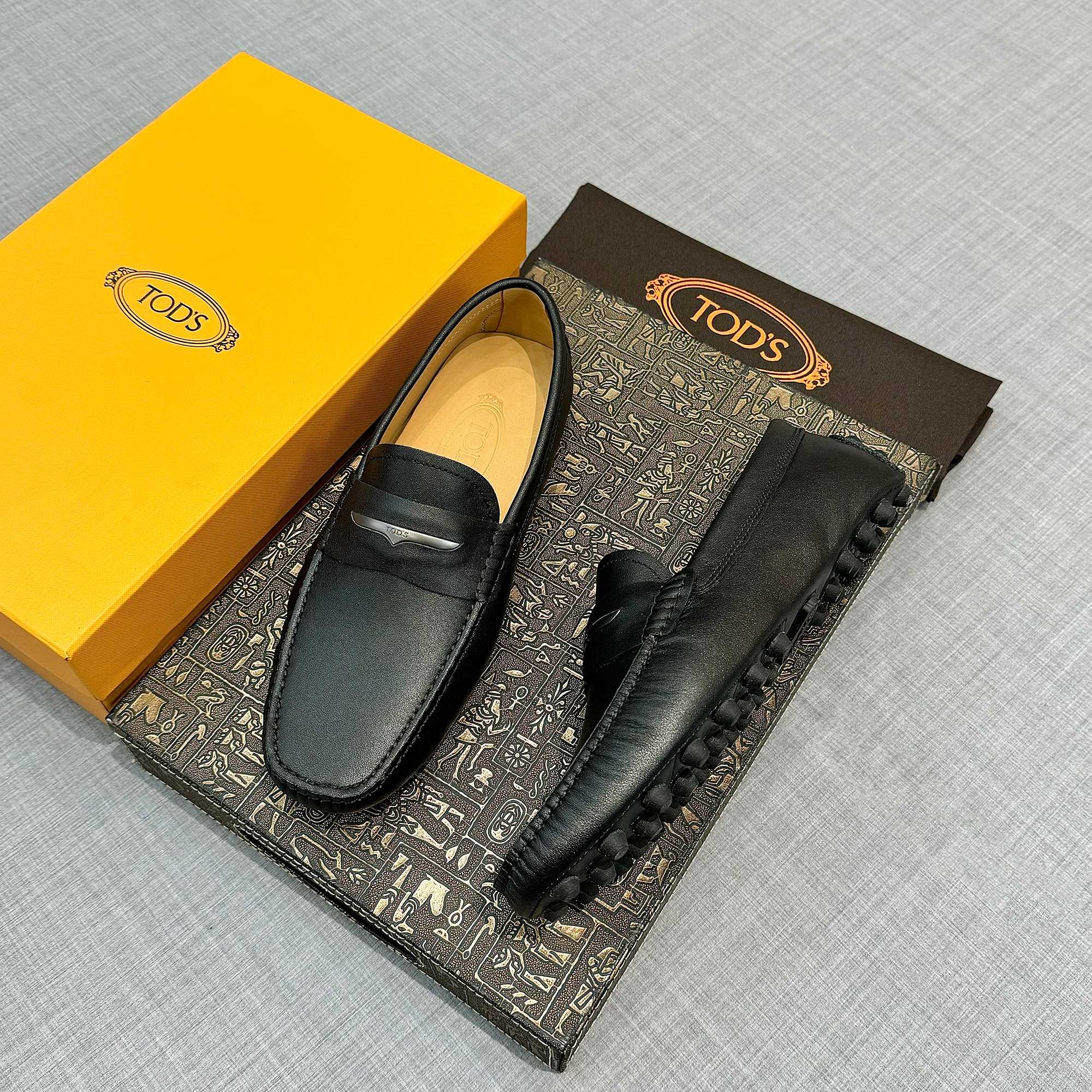 Precio de fábrica: [Tods] zapatos de hombre de soja Sincronización de contador nueva calidad de gama