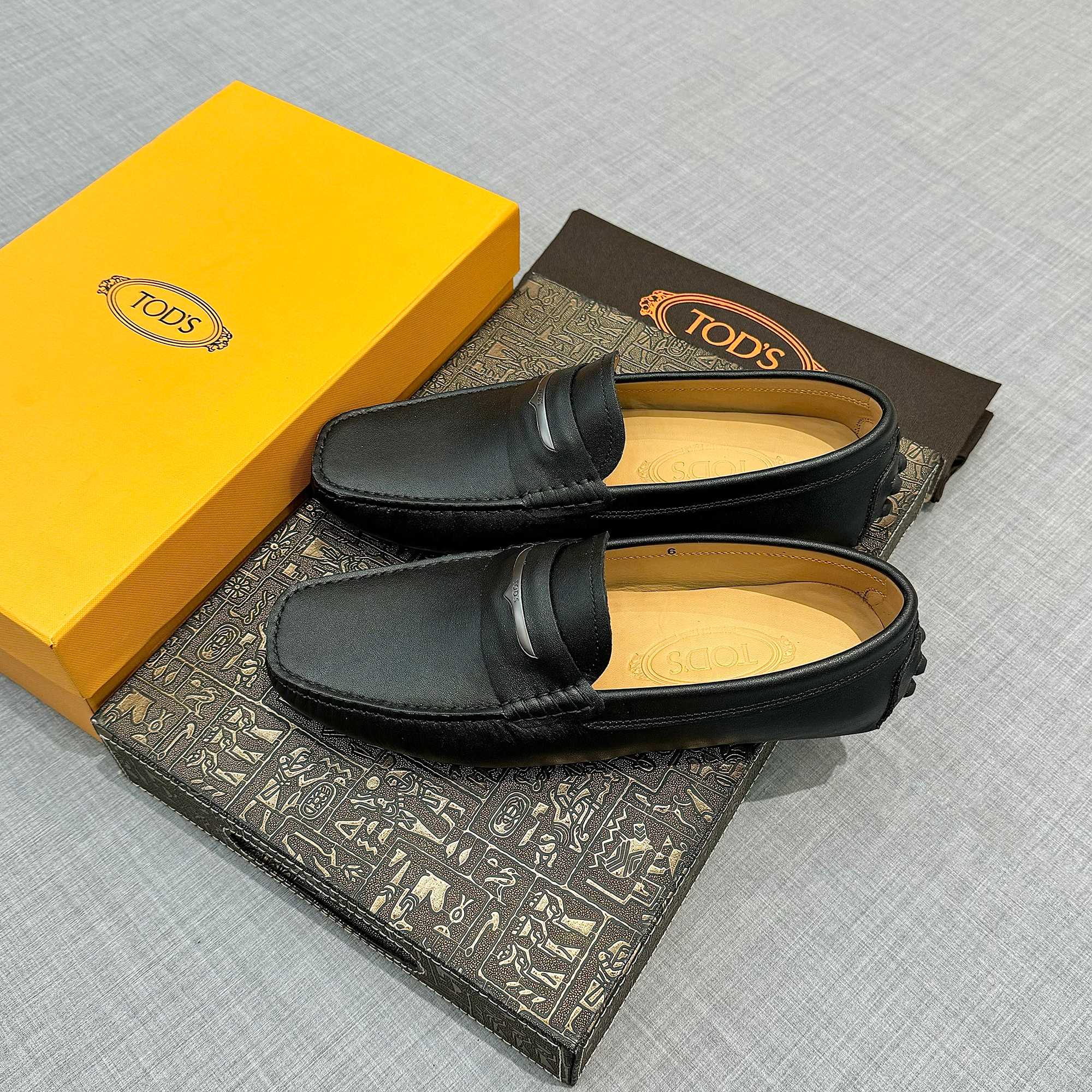 Precio de fábrica: [Tods] zapatos de hombre de soja Sincronización de contador nueva calidad de gama
