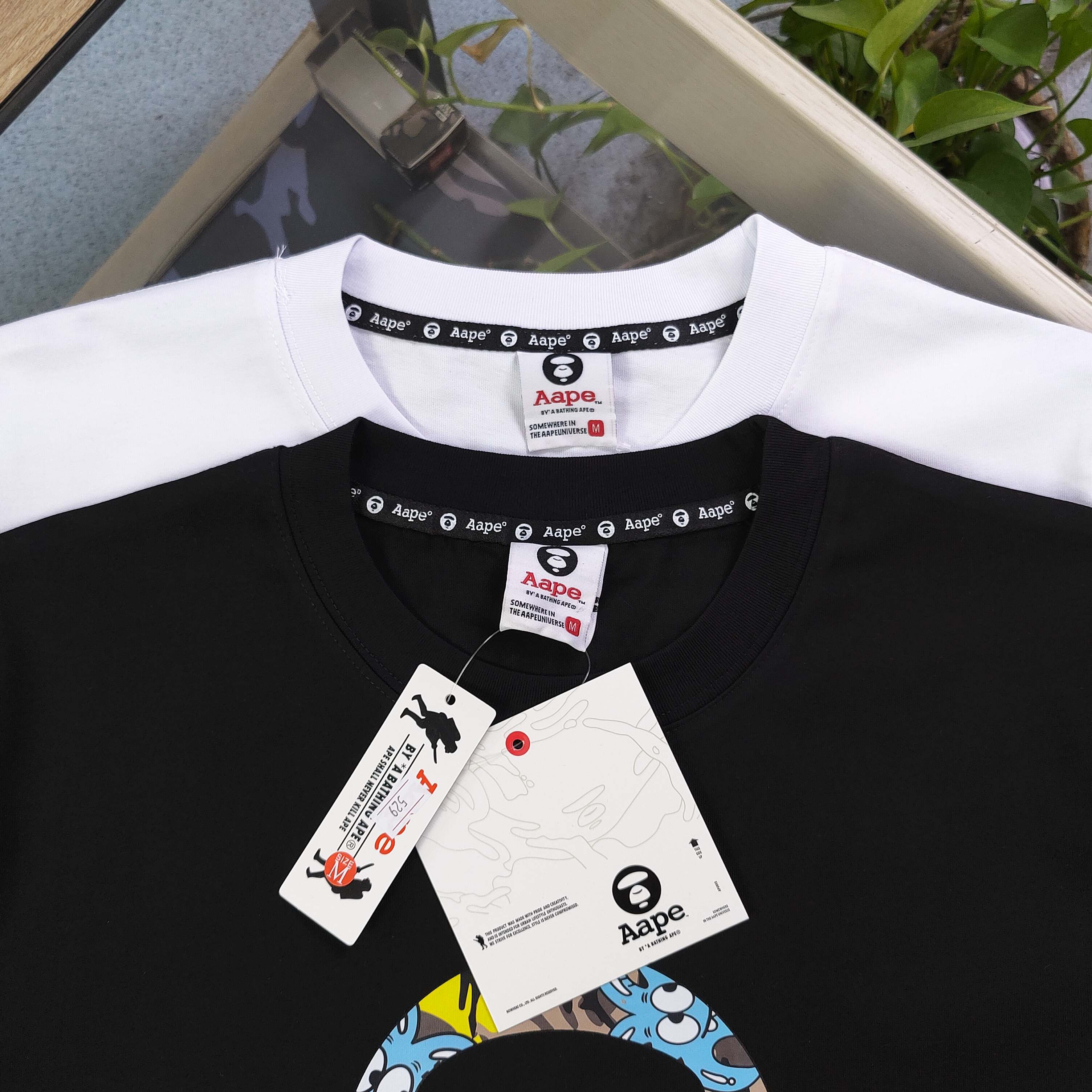 AAPE by A Bathing Ape Camiseta Estampada de Algodón para Hombre y Mujer 10 a1743957324983 7215