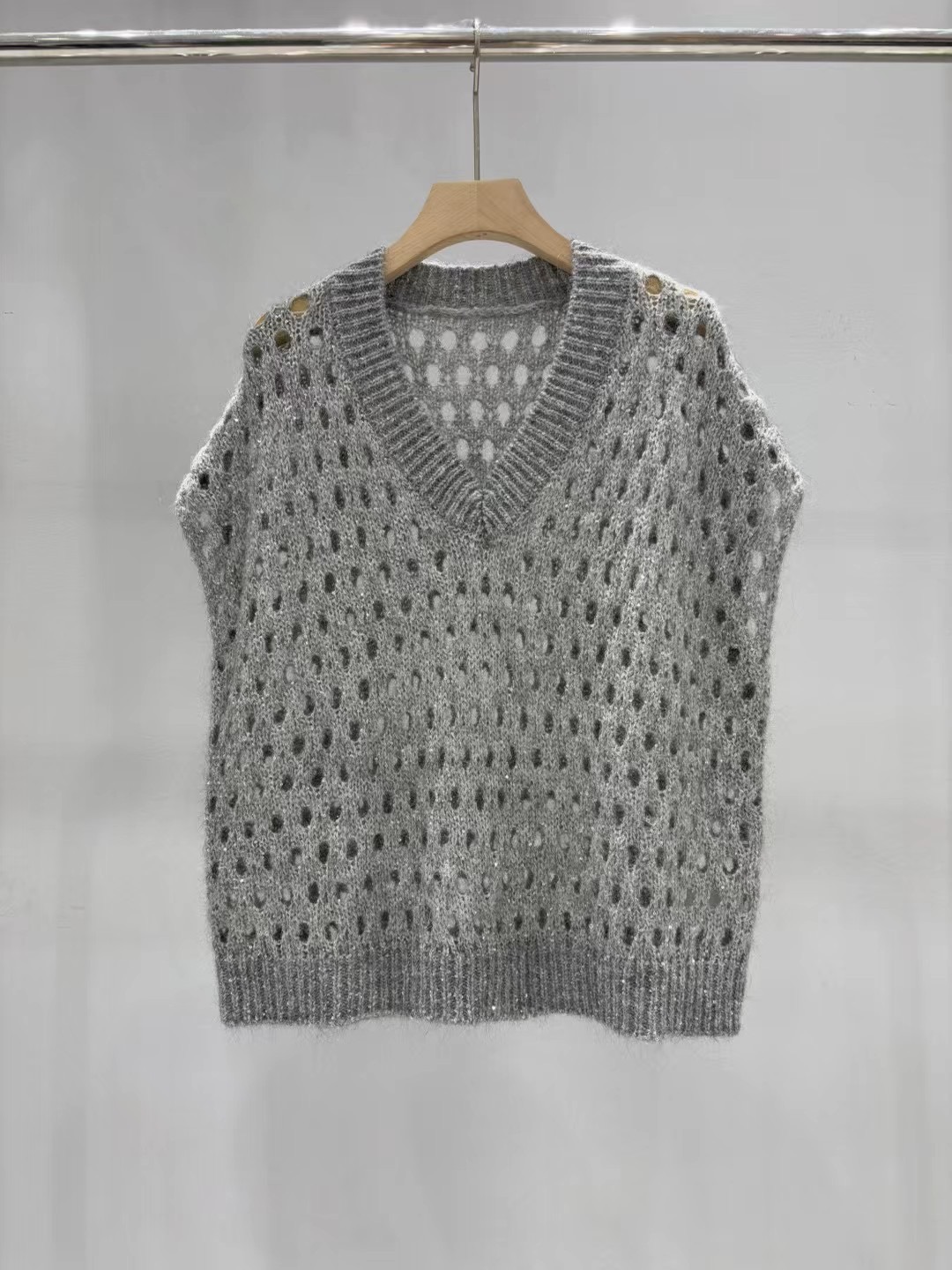 Gilet en maille ajourée à paillettes et col en V pour femme, coupe décontractée
