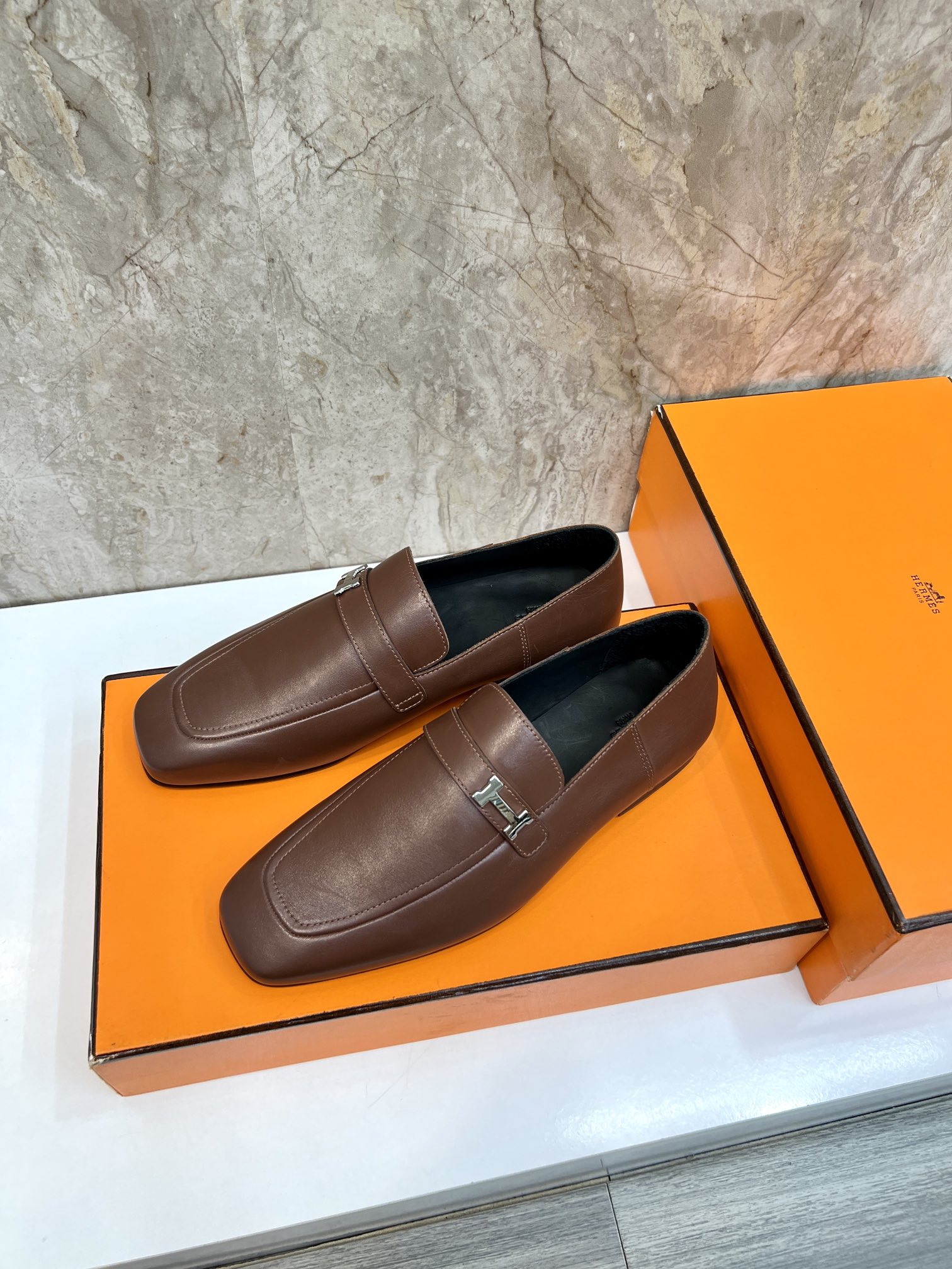 Hermès Giovanni Leather Loafers with Palladium Buckle - Elegant Style 3 i1696481112 7994 1