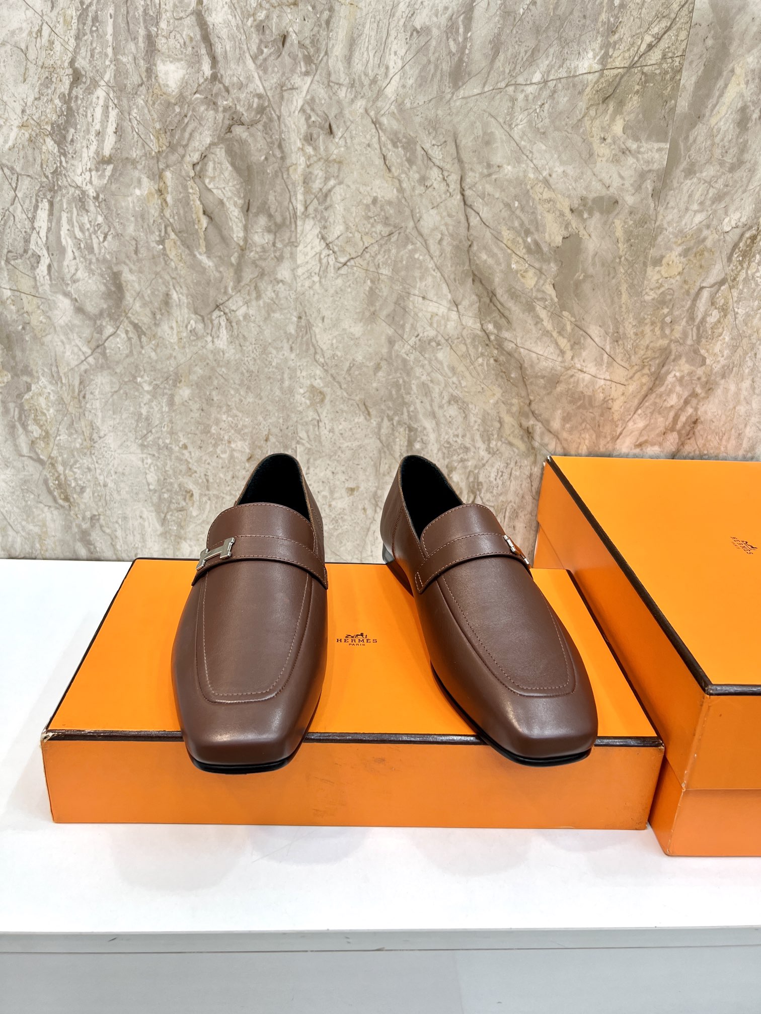 Hermès Giovanni Leather Loafers with Palladium Buckle - Elegant Style 4 i1696481112 9541 2