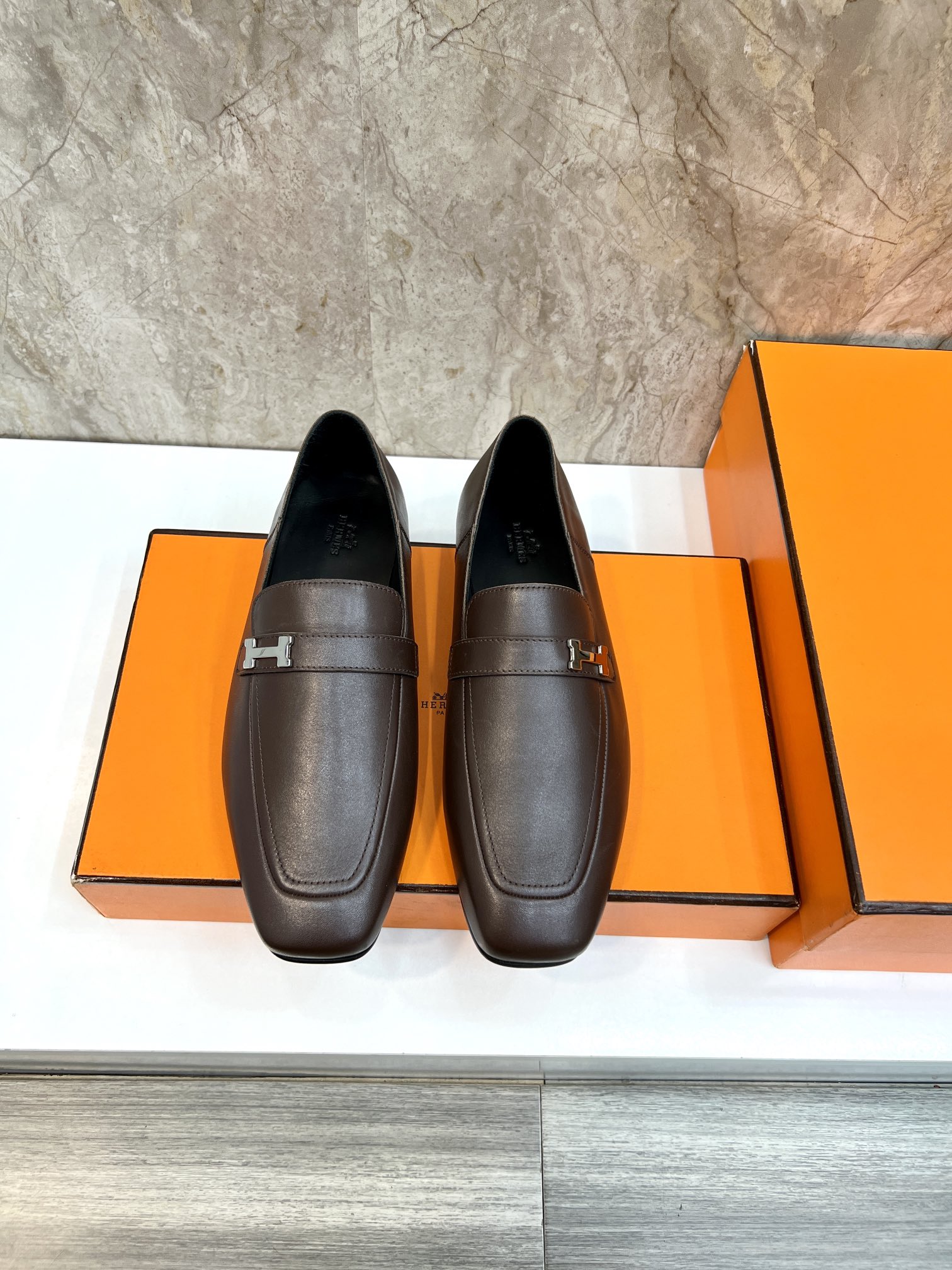 Hermès Giovanni Loafers in Brown Leather with Palladium Paris Buckle 1 Hermès Giovanni Loafers in Brown Leather with Palladium Paris Buckle