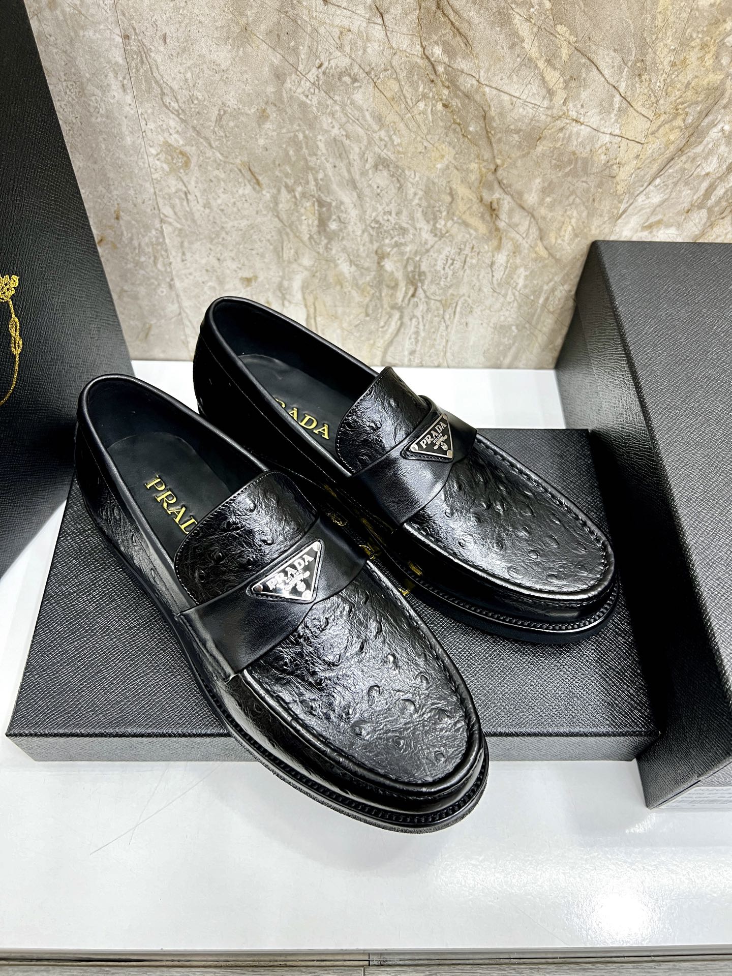 Prada Men's Black Leather Loafers with Ostrich Texture and Logo Accent 4 i1745038202611 1130 0 2