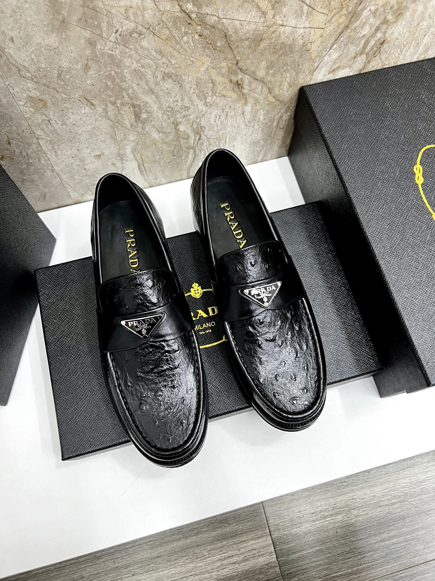 Prada Men's Black Leather Loafers with Ostrich Texture and Logo Accent 2 i1745038204468 5223 0 0