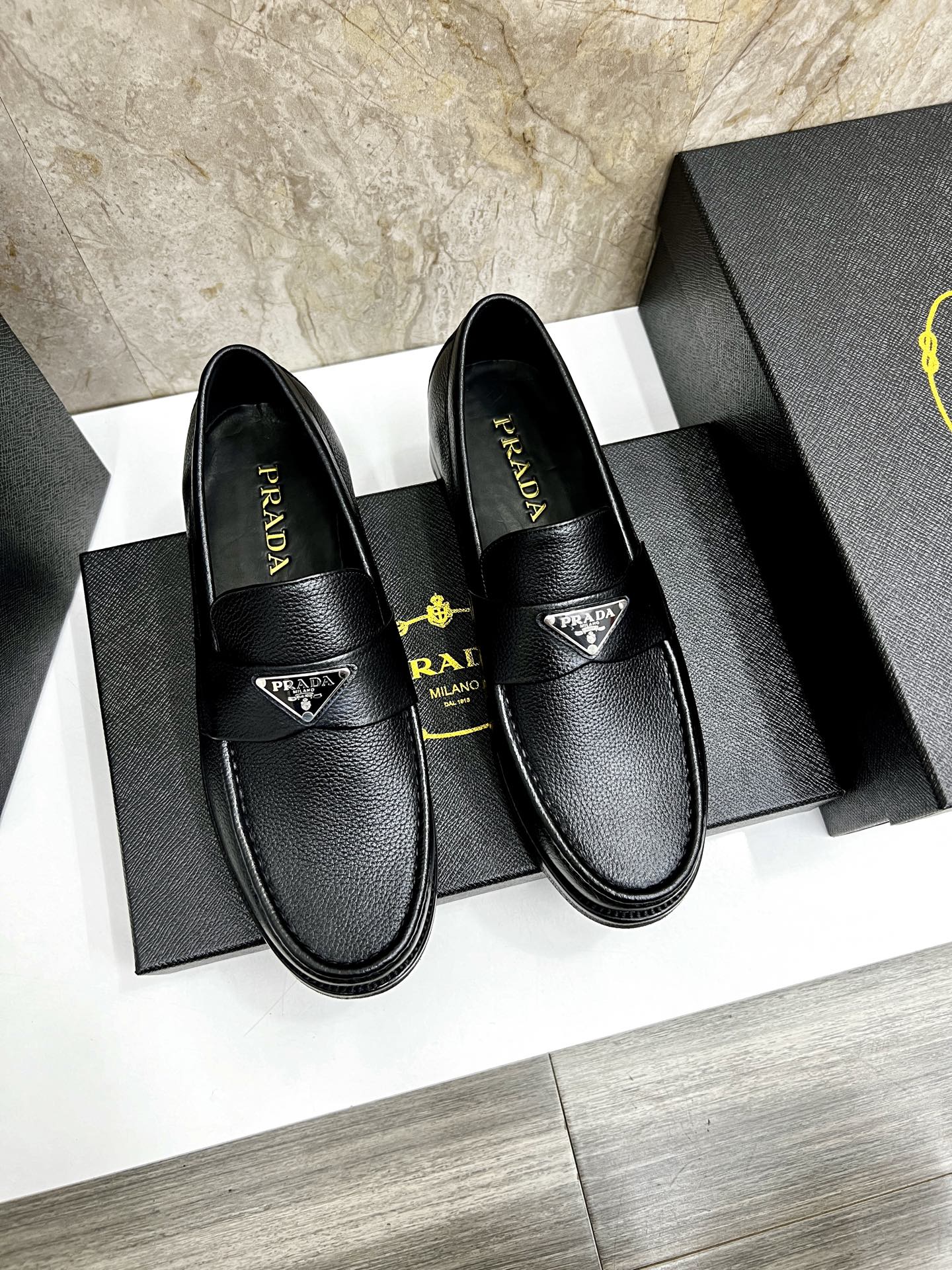 Prada Men's Black Leather Loafers with Metal Logo, Sizes 38-44 1 Prada Men's Black Leather Loafers with Metal Logo, Sizes 38-44