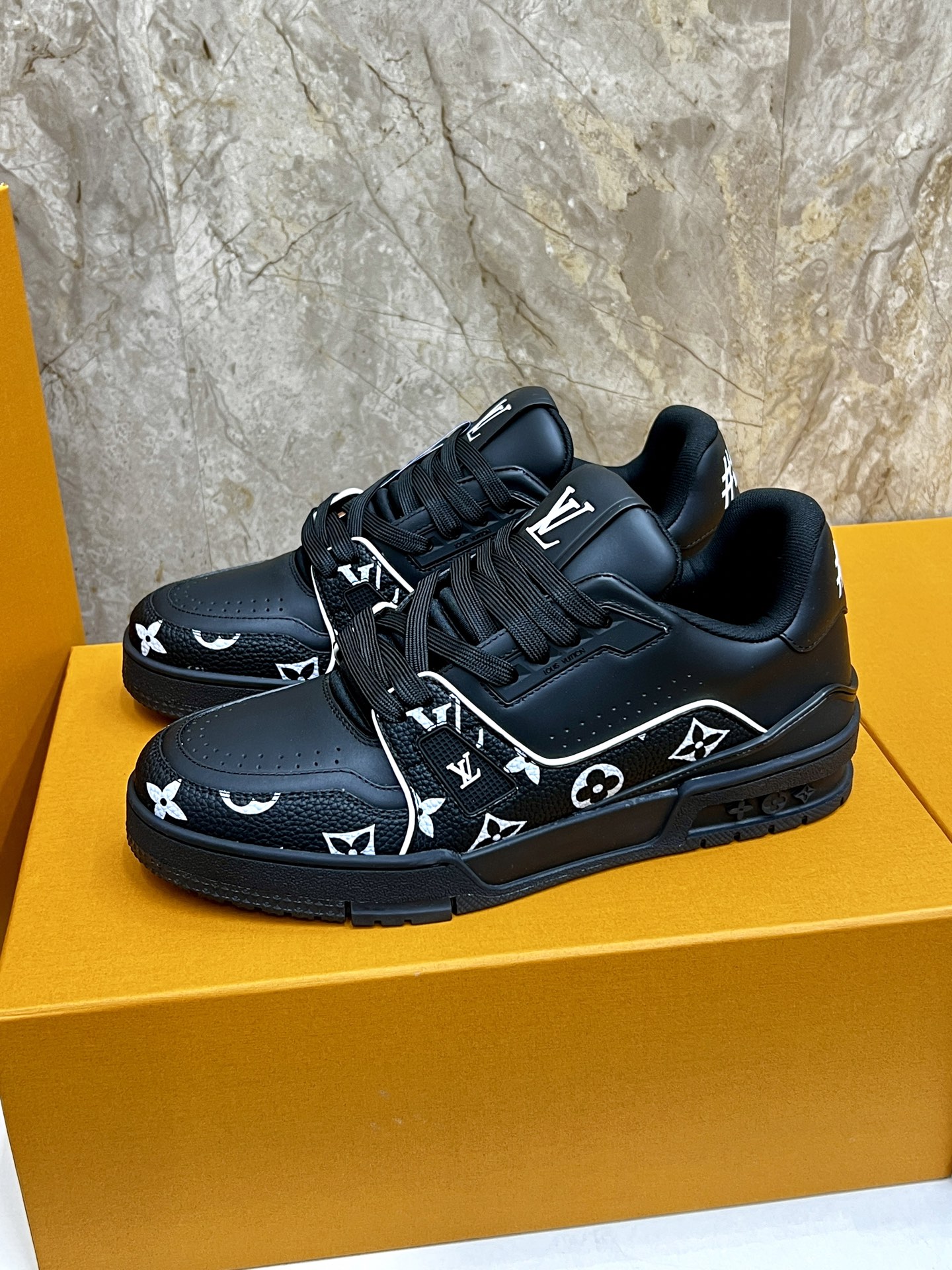 Louis Vuitton Trainer Sneaker: Black Leather, Monogram Accents - Iconic Style 1 Louis Vuitton Trainer Sneaker: Black Leather, Monogram Accents - Iconic Style