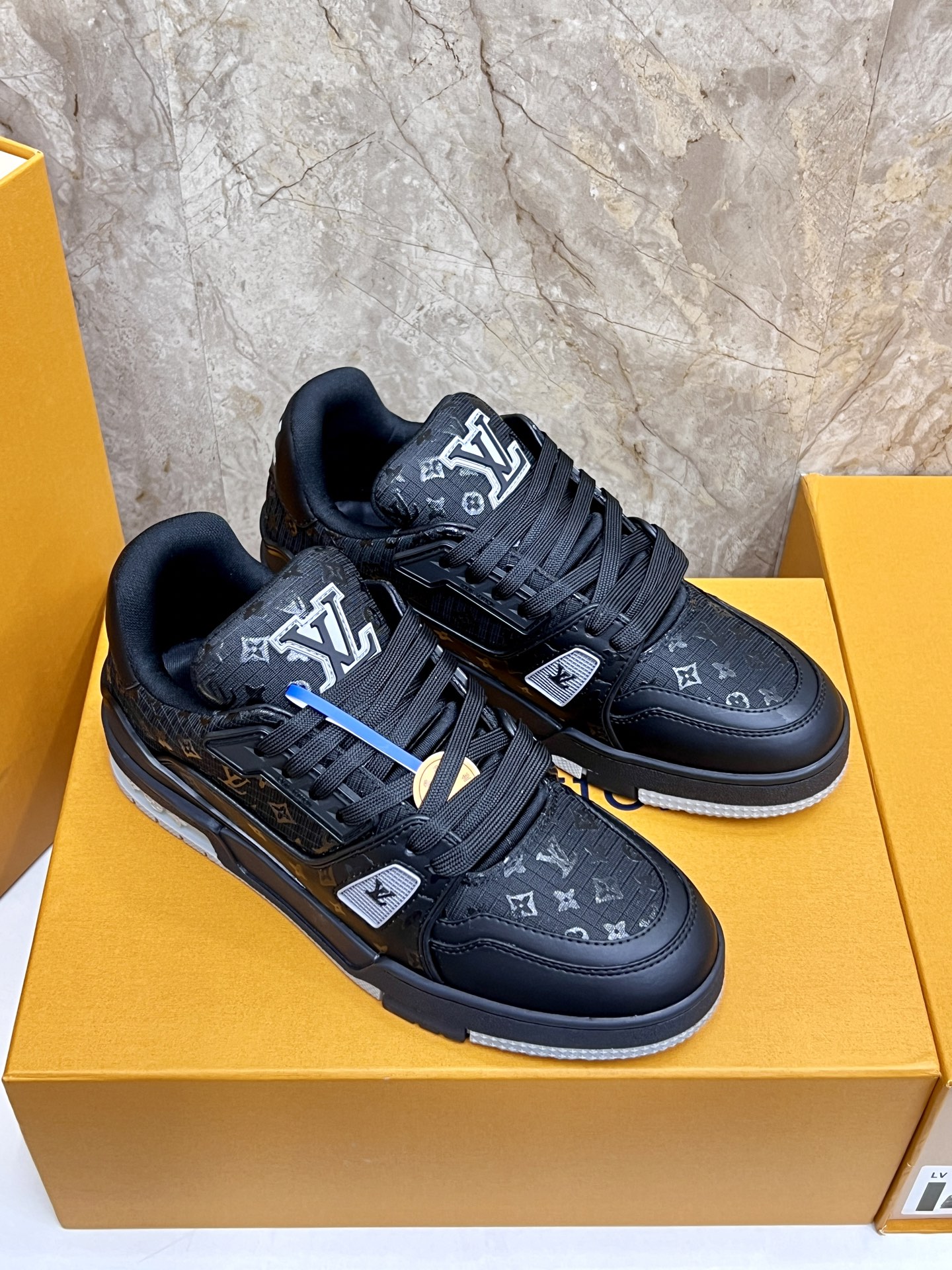 Louis Vuitton Trainer Sneakers: Black Leather, Monogram Detail, and Comfort 4 i1745214973649 5675 0 2