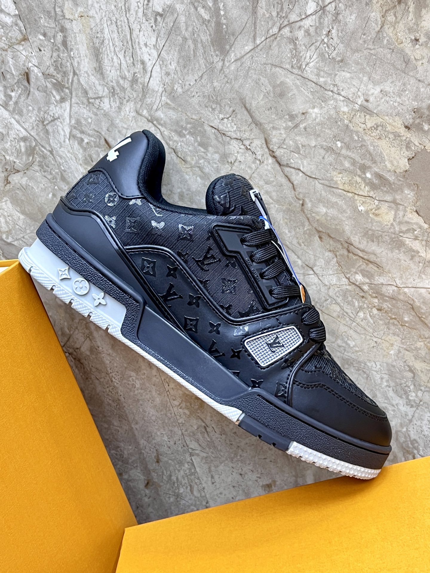 Louis Vuitton Trainer Sneakers: Black Leather, Monogram Detail, and Comfort 8 i1745214973717 2568 0 6