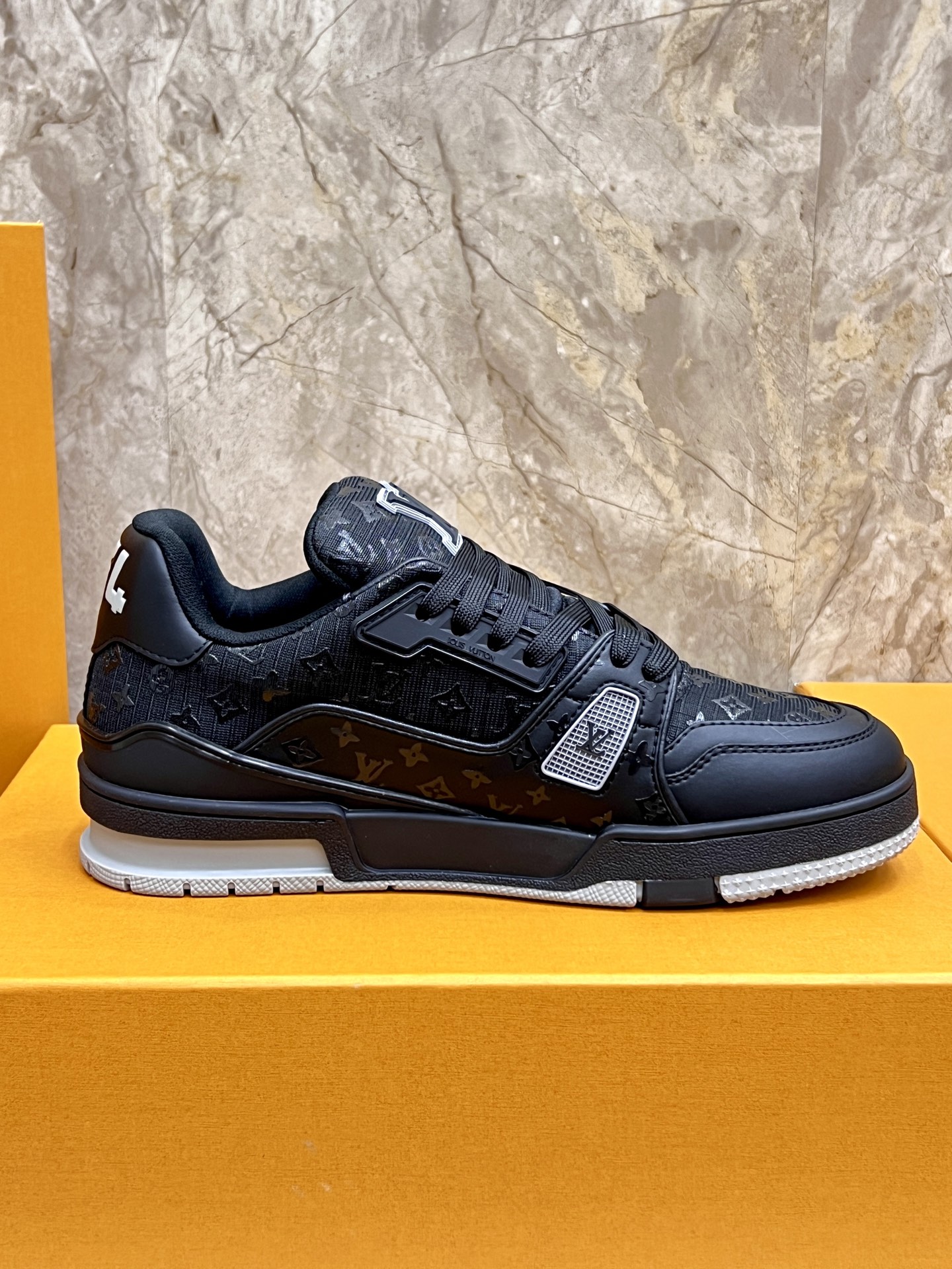 Louis Vuitton Trainer Sneakers: Black Leather, Monogram Detail, and Comfort 7 i1745214973743 8750 0 5