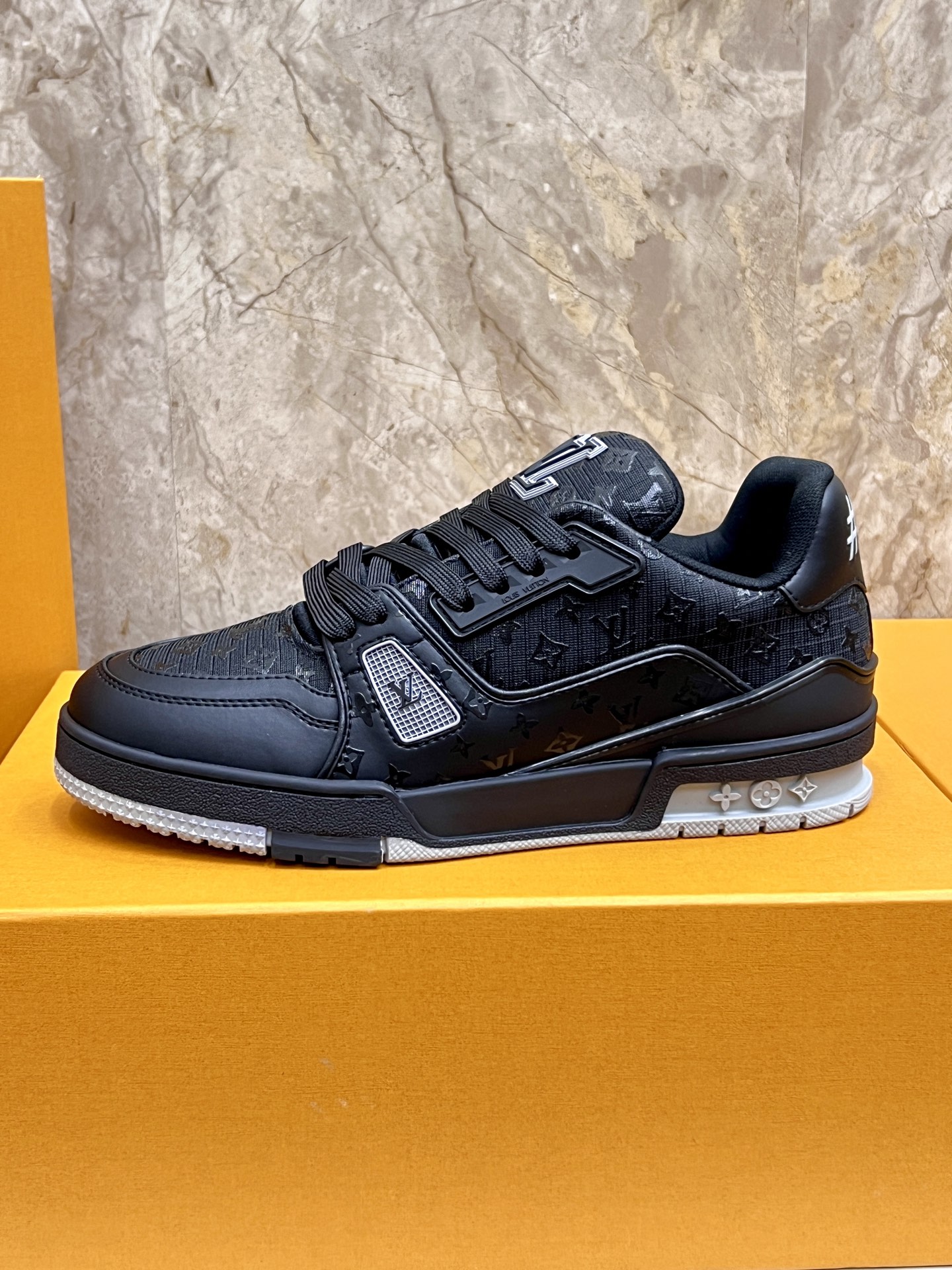 Louis Vuitton Trainer Sneakers: Black Leather, Monogram Detail, and Comfort 6 i1745214974958 4911 0 4