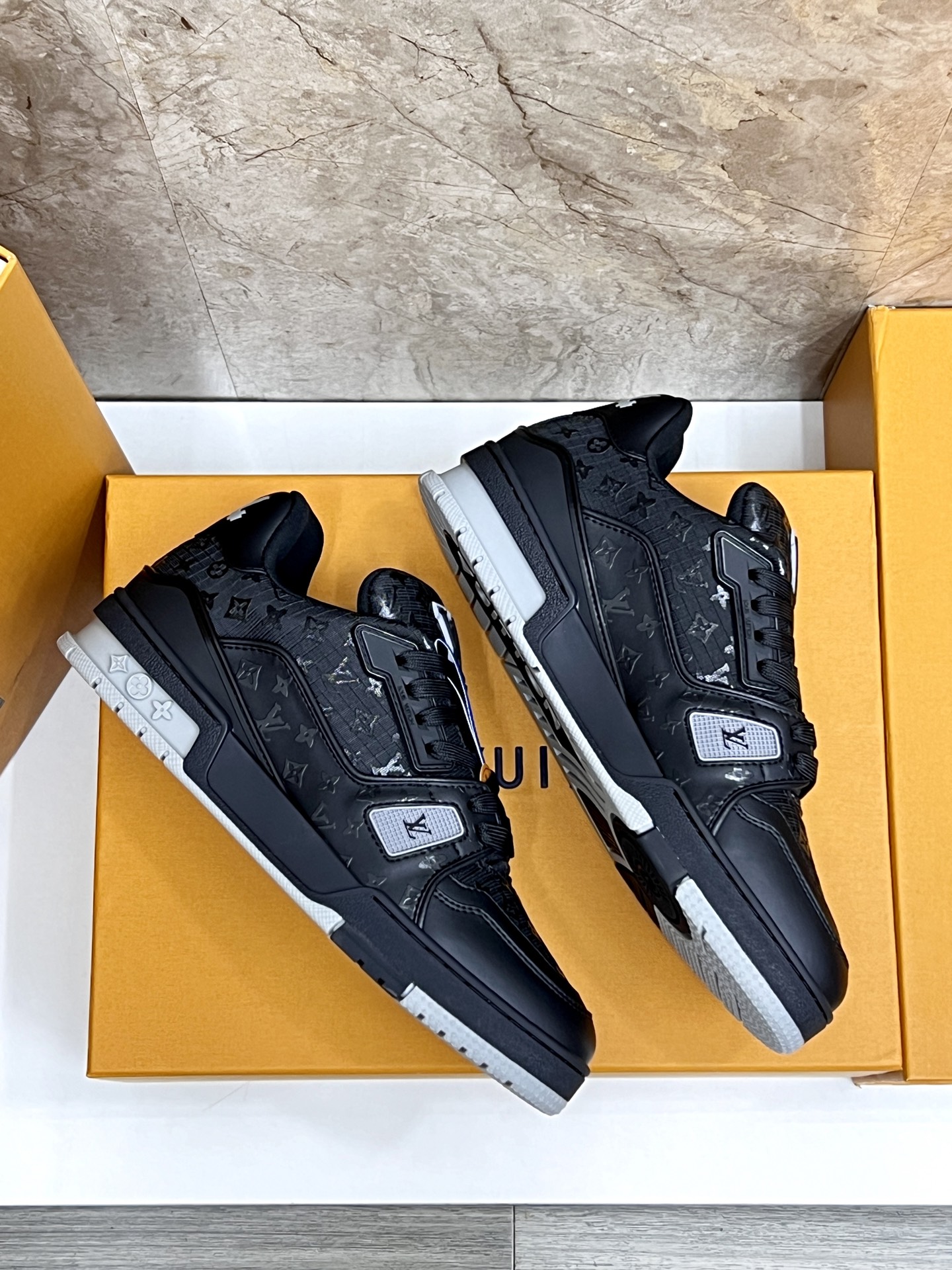 Louis Vuitton Trainer Sneakers: Black Leather, Monogram Detail, and Comfort 5 i1745214974959 850 0 3
