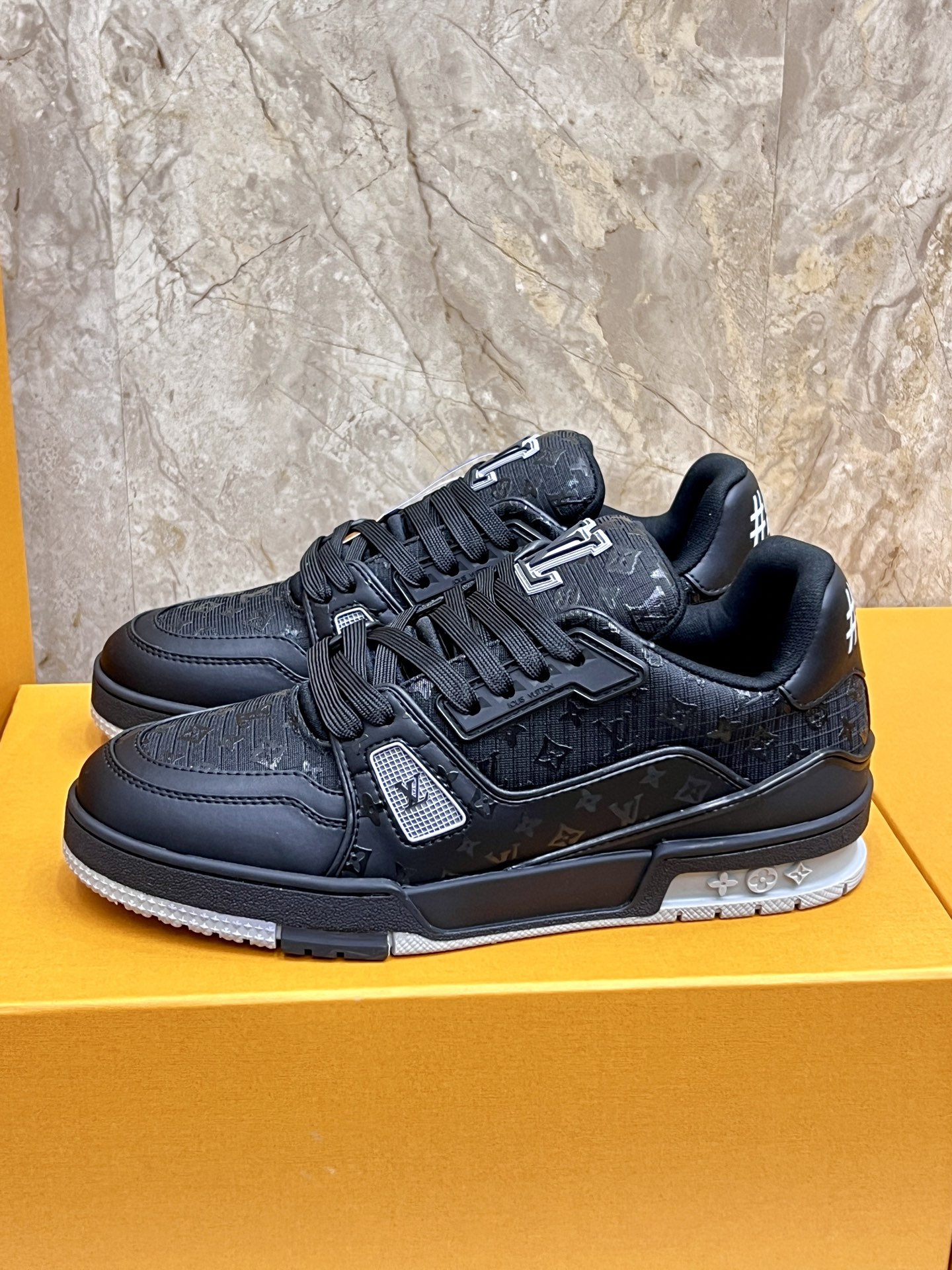 Louis Vuitton Trainer Sneakers: Black Leather, Monogram Detail, and Comfort 2 i1745214974988 7156 0 0
