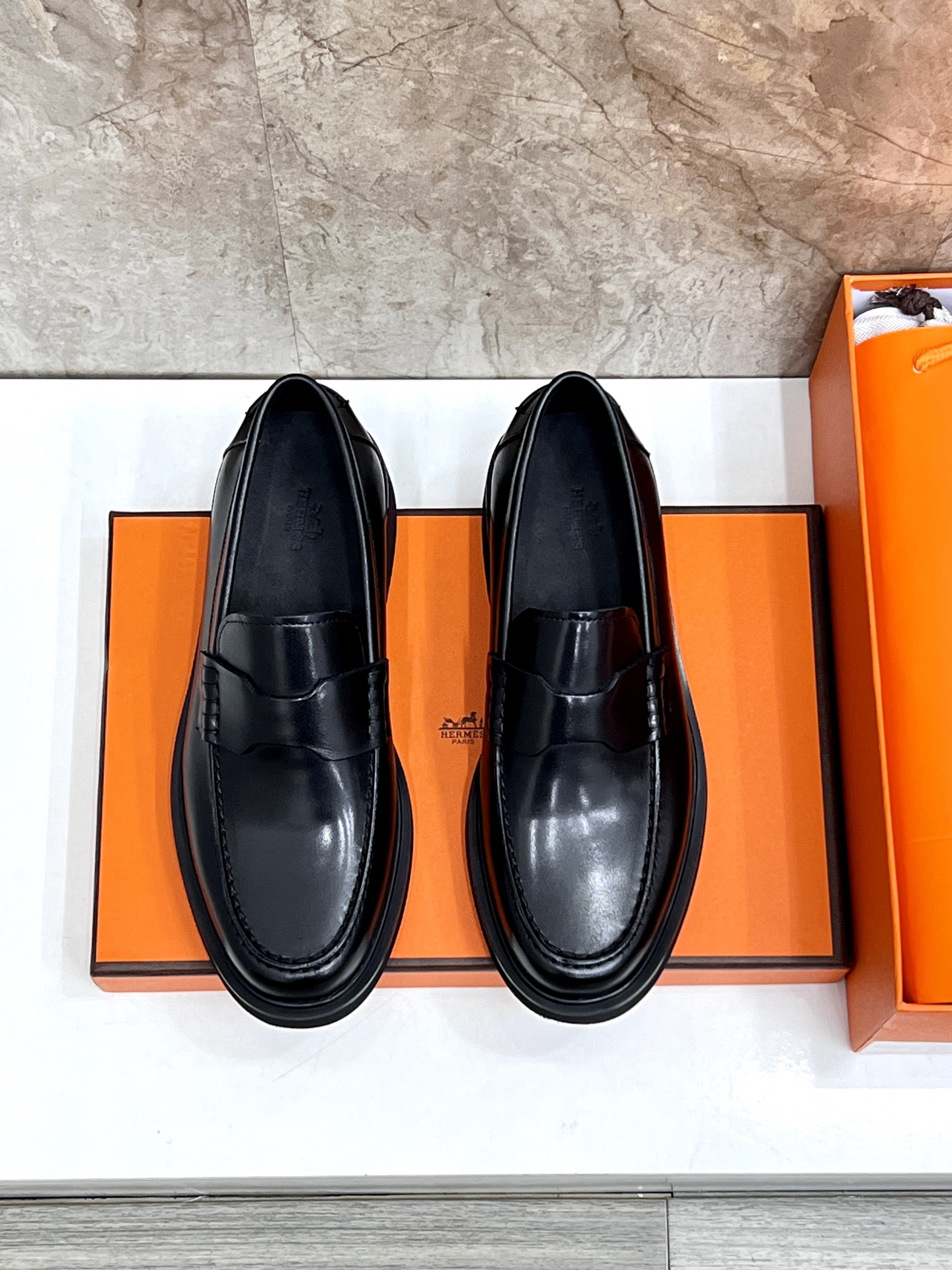 Hermès Giovanni Loafers: Black Leather with Palladium Paris Buckle, Elegant Style