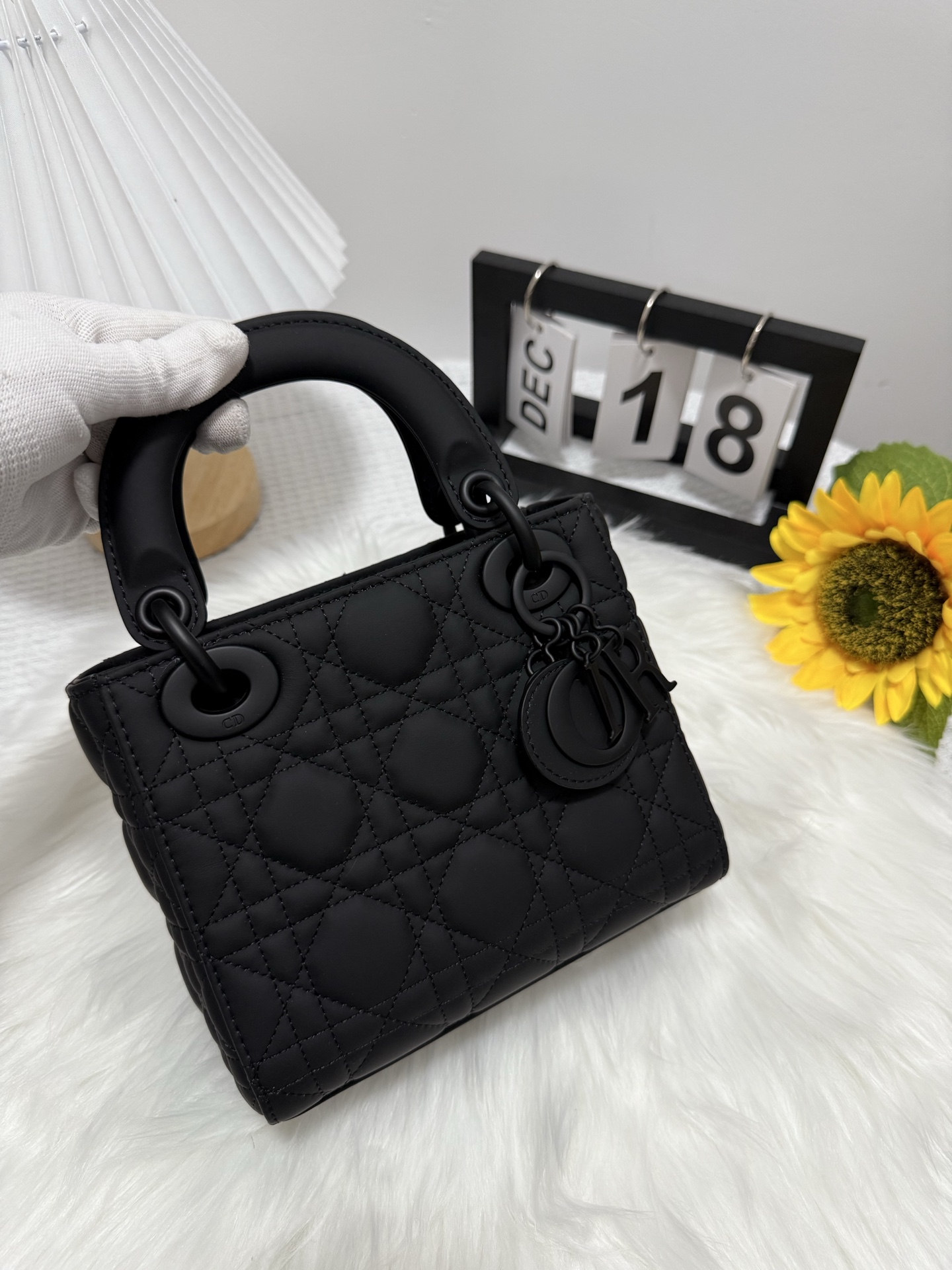 Elegant Black Lady Dior Mini Bag with Iconic Cannage Stitching and D.I.O.R. Charms 1 i1747586620433 1345 0 0