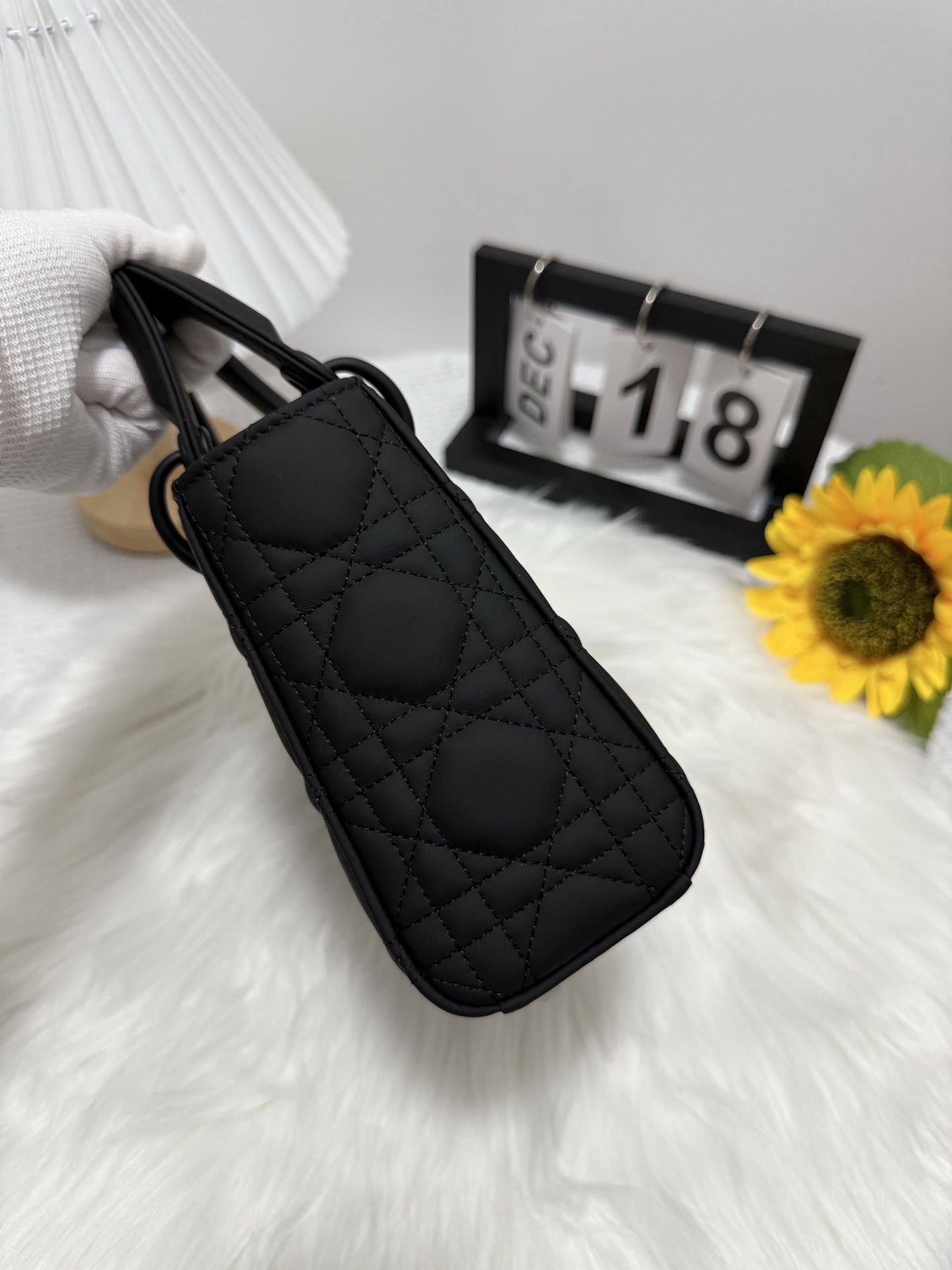 Elegant Black Lady Dior Mini Bag with Iconic Cannage Stitching and D.I.O.R. Charms 2 i1747586620550 2118 0 1