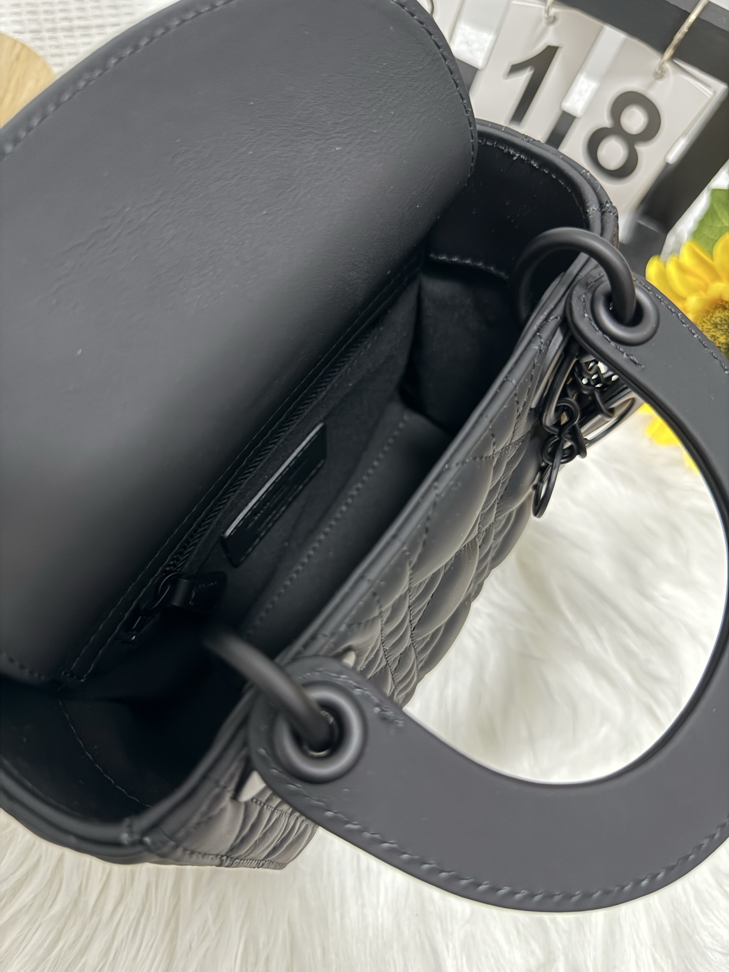 Elegant Black Lady Dior Mini Bag with Iconic Cannage Stitching and D.I.O.R. Charms 8 i1747586621568 5854 0 7