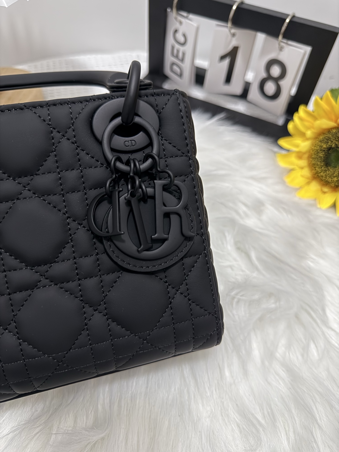 Elegant Black Lady Dior Mini Bag with Iconic Cannage Stitching and D.I.O.R. Charms 6 i1747586621608 2808 0 5