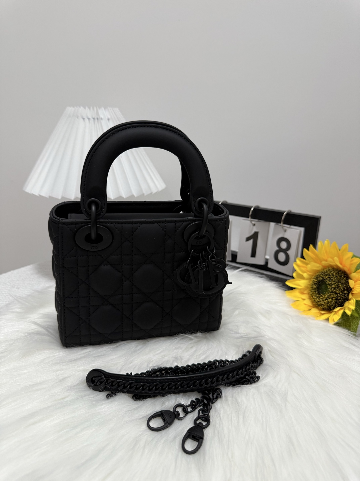 Elegant Black Lady Dior Mini Bag with Iconic Cannage Stitching and D.I.O.R. Charms 9 i1747586621664 6448 0 8
