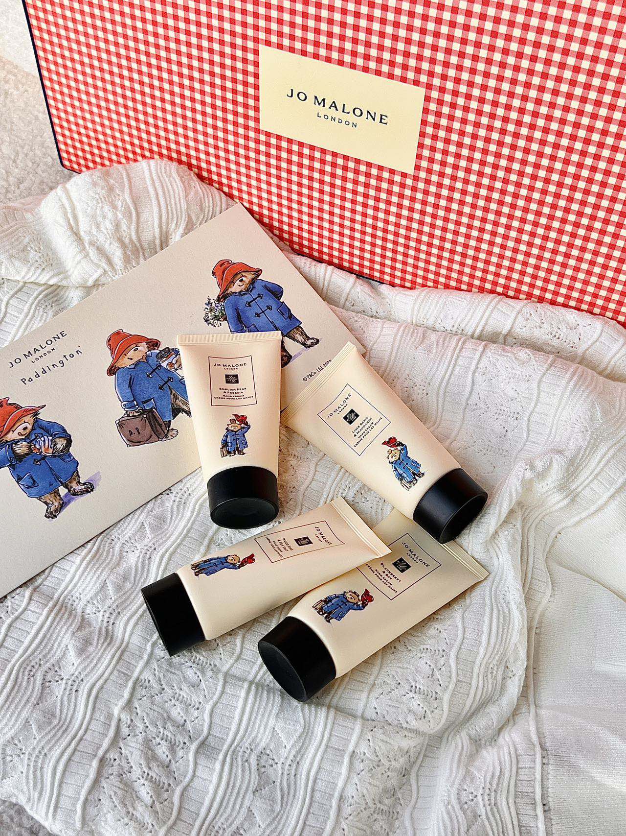Includes gift box packaging, a matching shopping bag, and a Paddington - Comprehensive 5