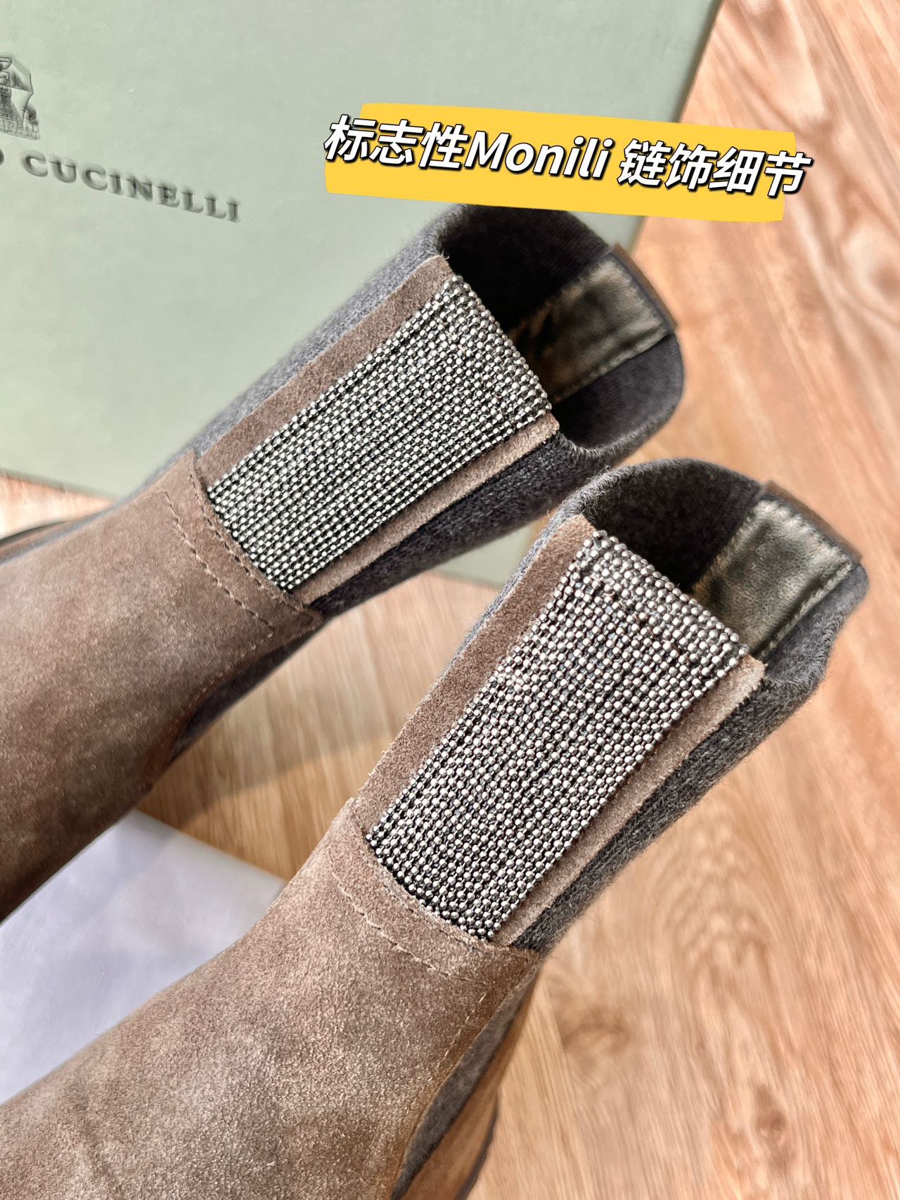 Featuring signature Monili chain embellishments, a sock-style ankle, a - Comprehensive