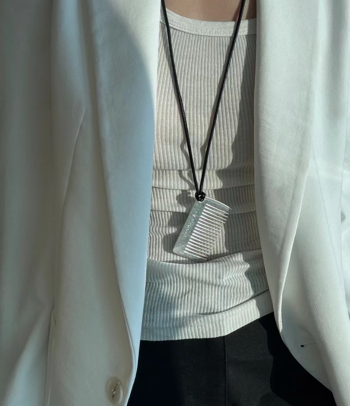 Designed for versatile styling, the comb necklace pairs seamlessly with - Comprehensive 6