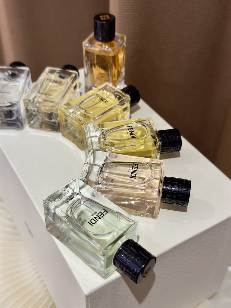 Each fragrance bottle features English labeling on the base - Perfume 3