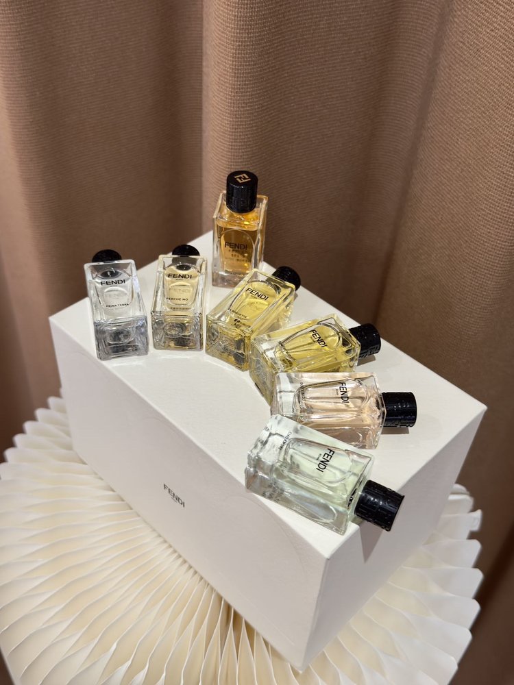 Each fragrance bottle features English labeling on the base - Perfume 2