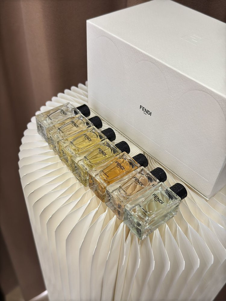 Each fragrance bottle features English labeling on the base - Perfume