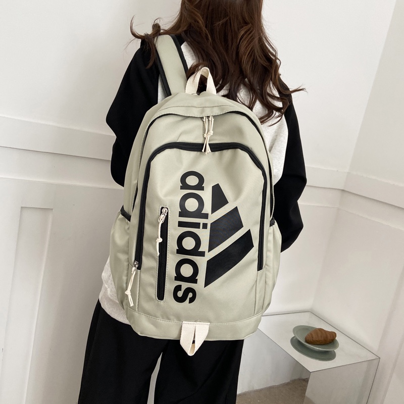 供货价:63💰开学季背包🎒原单好货,原包装吊牌，，Adidas阿迪达斯 街头潮流大容量休闲双肩包男女同款百搭运动背包校园高中大学生书包电脑包 尺寸:44×29×19