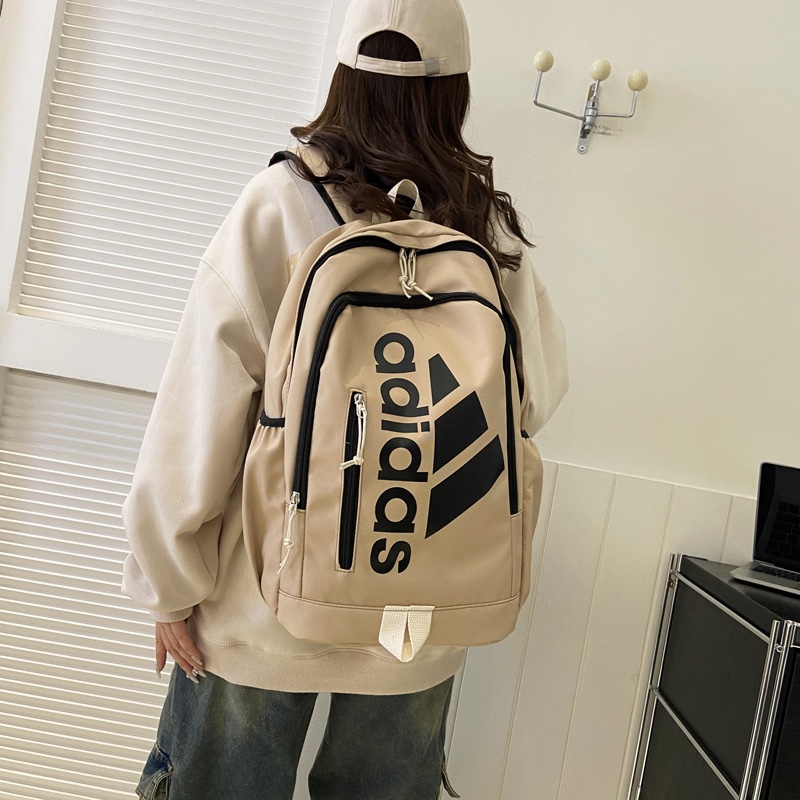 供货价:63💰开学季背包🎒原单好货,原包装吊牌，，Adidas阿迪达斯 街头潮流大容量休闲双肩包男女同款百搭运动背包校园高中大学生书包电脑包 尺寸:44×29×19