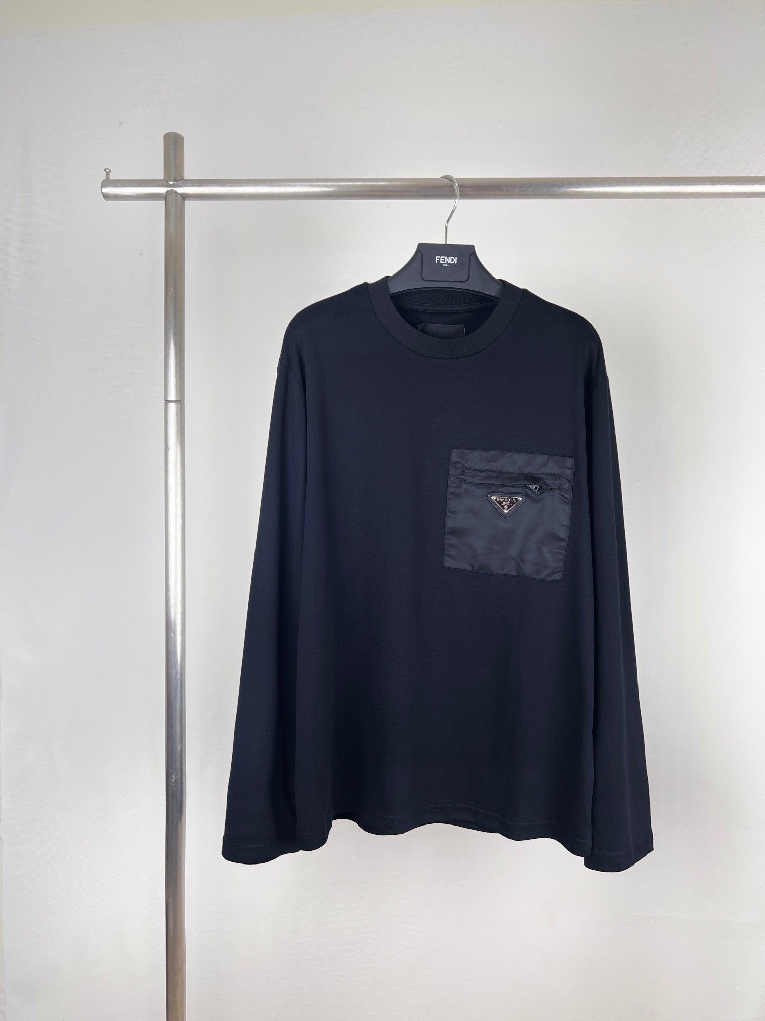 Is it illegal to buy dupe
 Prada Clothing T-Shirt Long Sleeve